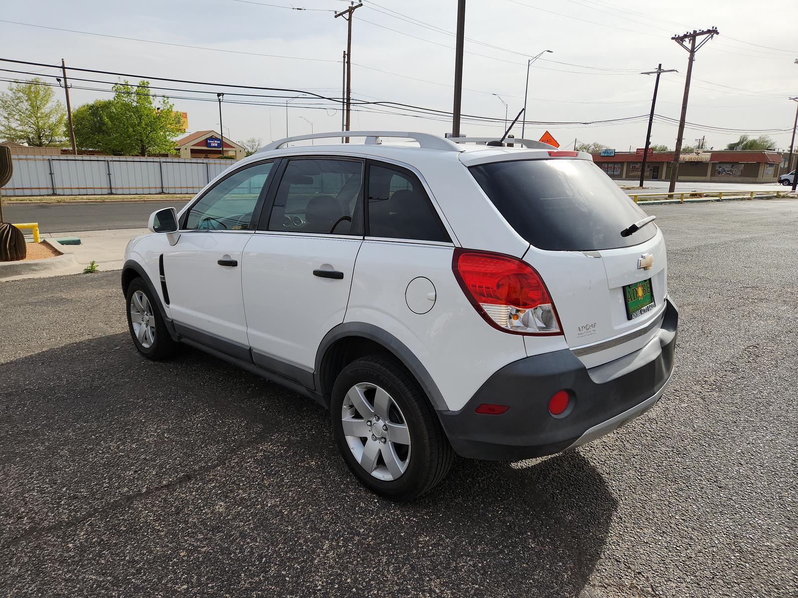 2012 Arctic Ice /Black Chevrolet Captiva Sport Fleet LS w/2LS (3GNAL2EK3CS) with an ENGINE, 2.4L DOHC 4-CYLINDER SIDI (SPARK IGNITION DIRECT INJECTION) engine, located at 4711 Ave Q, Lubbock, TX, 79412, (806) 687-2362, 33.551304, -101.855293 - Photo #2