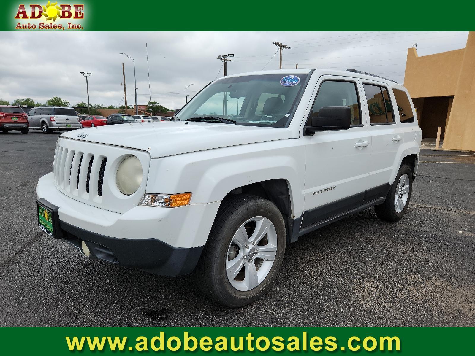 2012 Bright White /Dark Slate Gray Leather Interior Jeep Patriot Limited (1C4NJPCB9CD) with an 2.4L DOHC 16V I4 DUAL-VVT ENGINE engine, located at 4711 Ave Q, Lubbock, TX, 79412, (806) 687-2362, 33.551304, -101.855293 - Photo #0