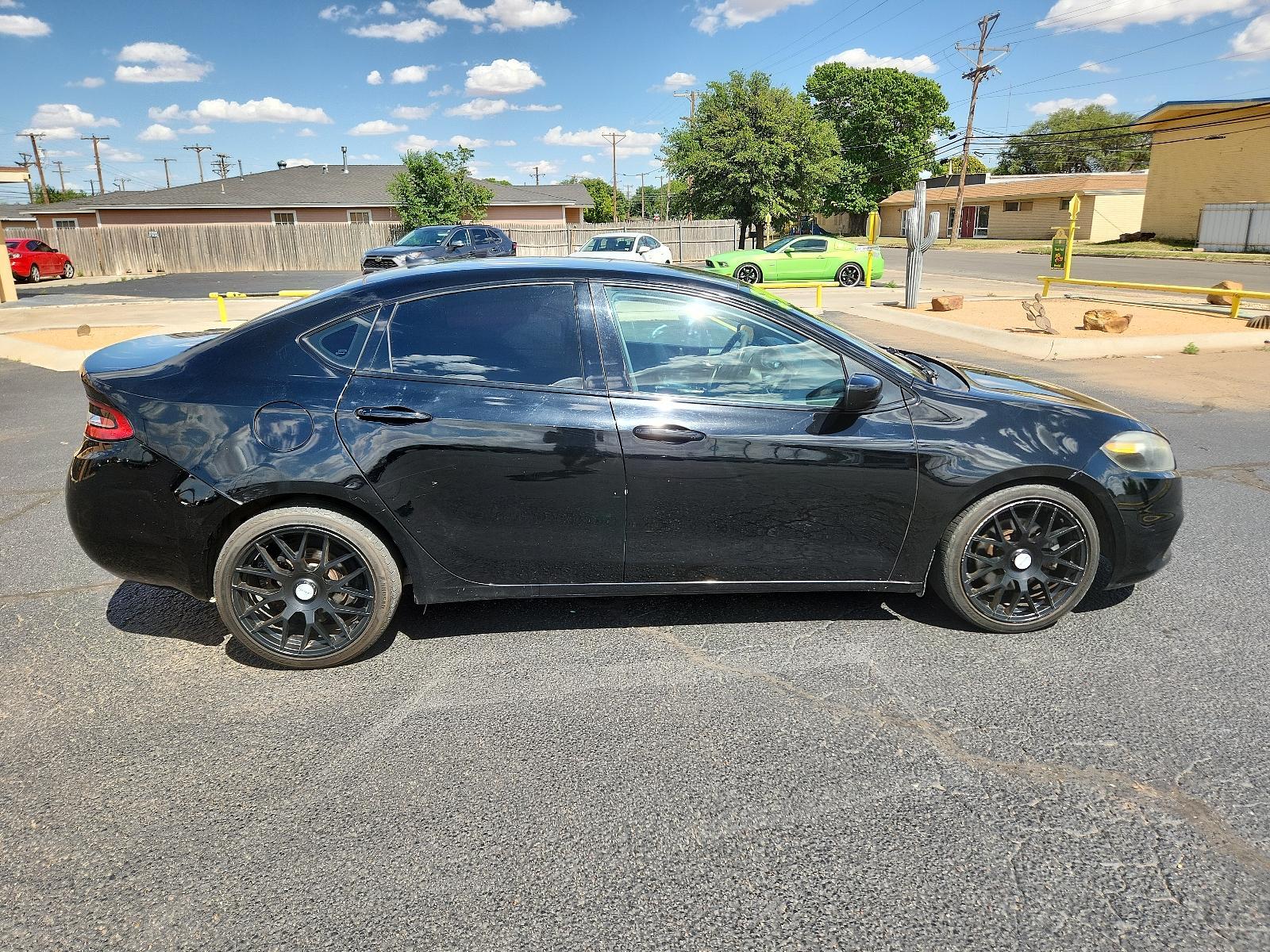 2015 Pitch Black Clearcoat /Black Dodge Dart SXT (1C3CDFBB0FD) with an ENGINE: 2.4L I4 MULTIAIR engine, located at 4711 Ave Q, Lubbock, TX, 79412, (806) 687-2362, 33.551304, -101.855293 - Photo #5