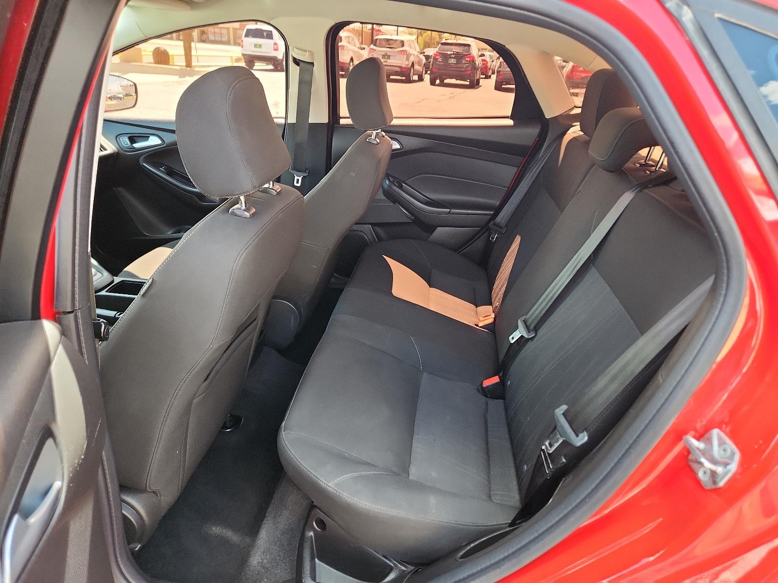 2017 Race Red /Charcoal Black Insert w/Warm Steel Surround, cloth Ford Focus SE (1FADP3F27HL) with an ENGINE: 2.0L I-4 GDI TI-VCT FLEX FUEL engine, located at 4711 Ave Q, Lubbock, TX, 79412, (806) 687-2362, 33.551304, -101.855293 - Photo #9
