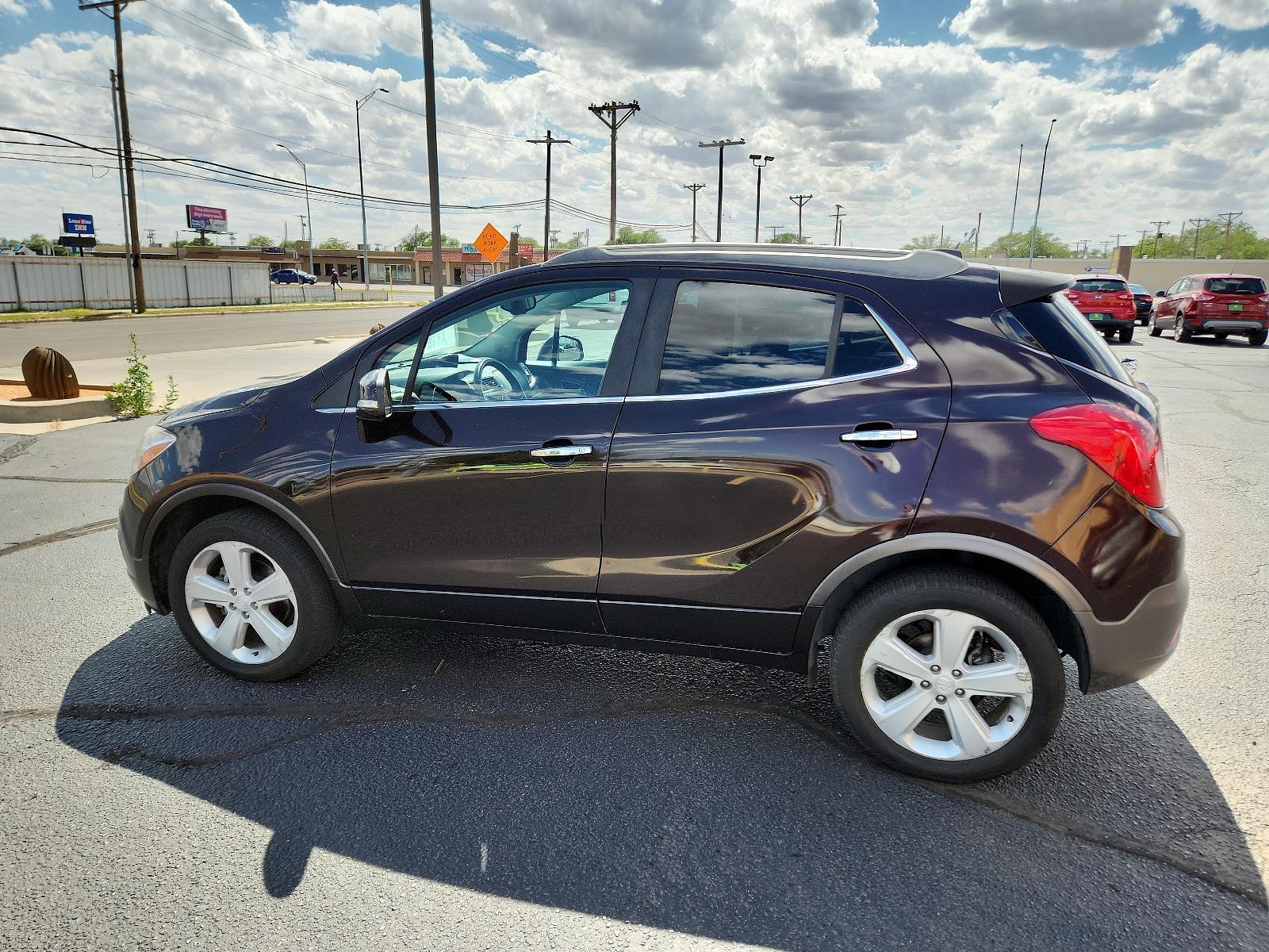 2015 Deep Espresso Brown Metallic/Dark Cocoa Ash /Ebony, leather Buick Encore Premium (KL4CJHSB0FB) with an ENGINE, ECOTEC TURBO 1.4L VARIABLE VALVE TIMING DOHC 4-CYLINDER SEQUENTIAL MFI engine, located at 4711 Ave Q, Lubbock, TX, 79412, (806) 687-2362, 33.551304, -101.855293 - Photo #1