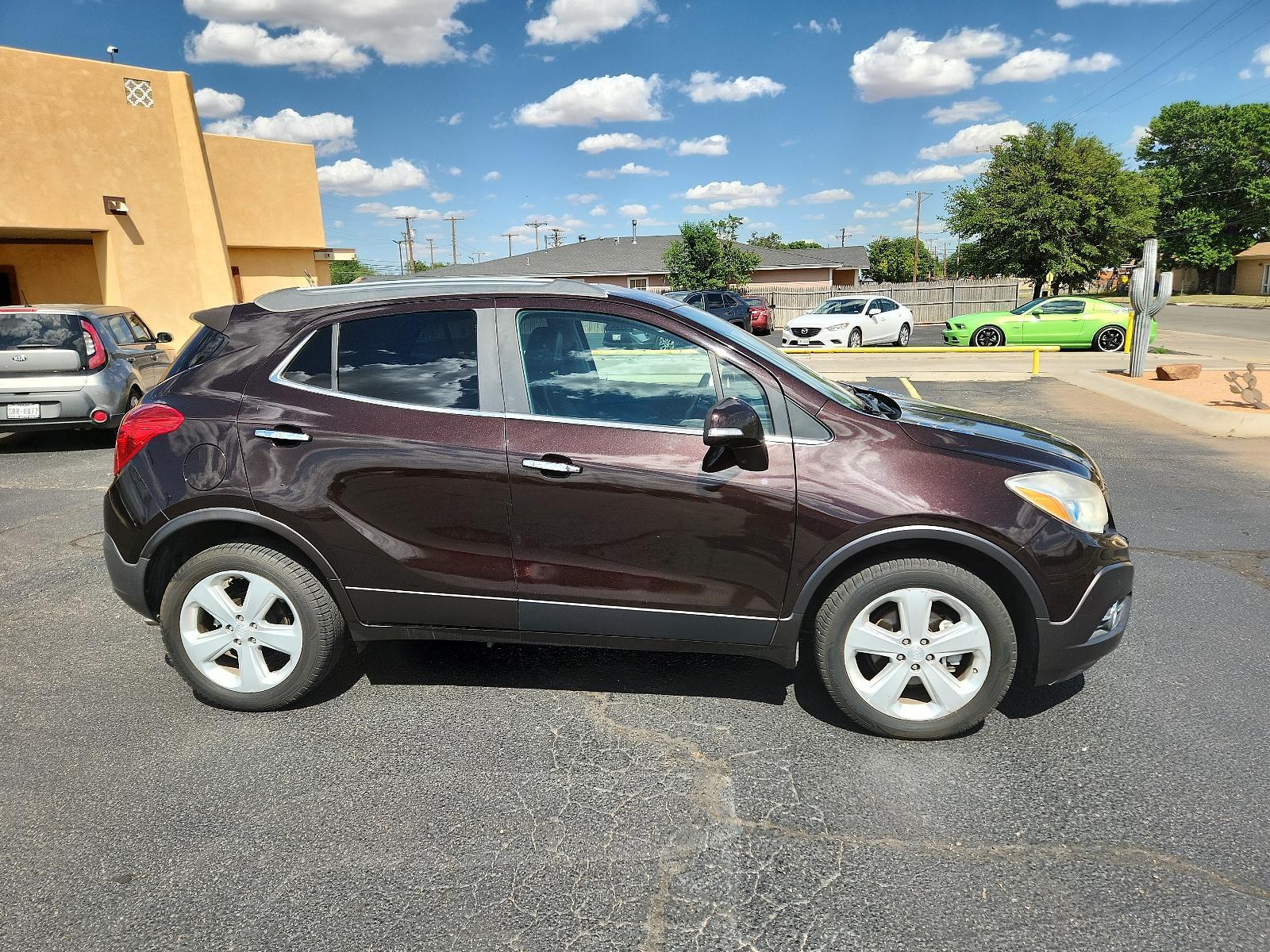 2015 Deep Espresso Brown Metallic/Dark Cocoa Ash /Ebony, leather Buick Encore Premium (KL4CJHSB0FB) with an ENGINE, ECOTEC TURBO 1.4L VARIABLE VALVE TIMING DOHC 4-CYLINDER SEQUENTIAL MFI engine, located at 4711 Ave Q, Lubbock, TX, 79412, (806) 687-2362, 33.551304, -101.855293 - Photo #5
