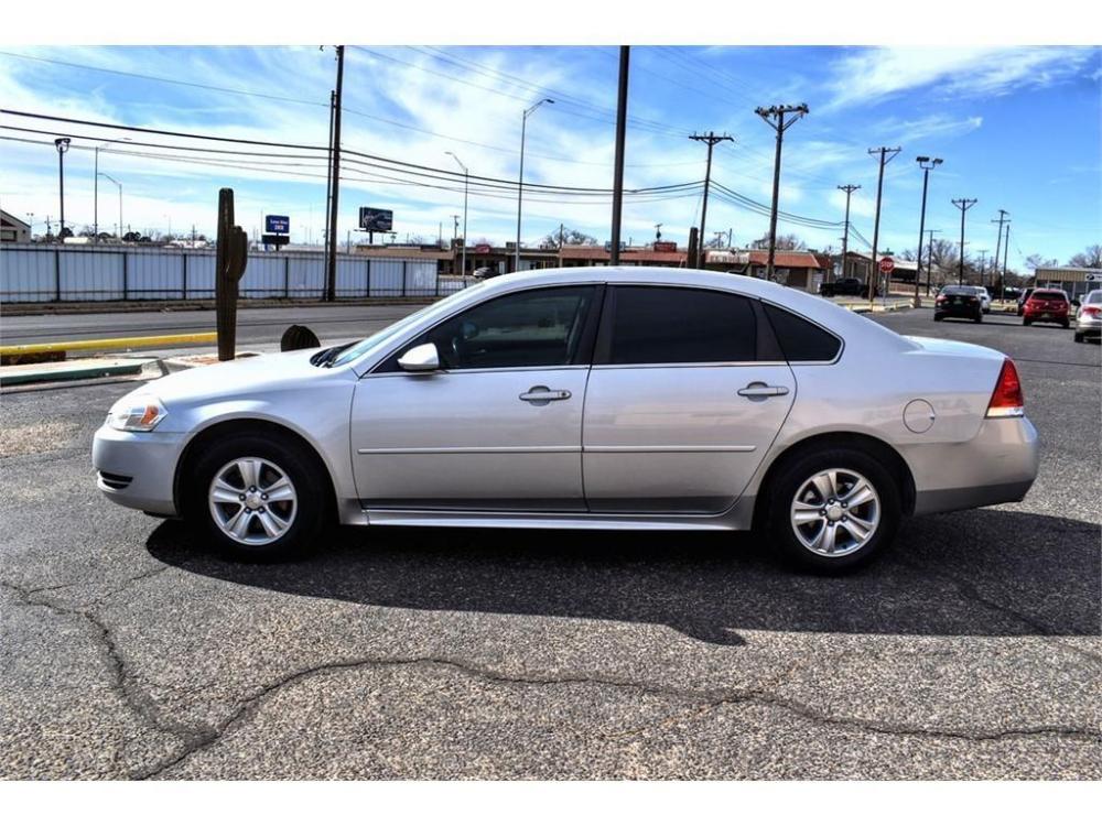 2013 SILVER ICE METALLIC /GRAY CLOTH INTERIOR Chevrolet Impala 4dr Sdn LS Retail (2G1WA5E35D1) with an 3.6L V6 DOHC 16V FFV engine, 6-SPEED AUTOMATIC transmission, located at 4711 Ave Q, Lubbock, TX, 79412, (806) 687-2362, 33.551304, -101.855293 - Photo #1