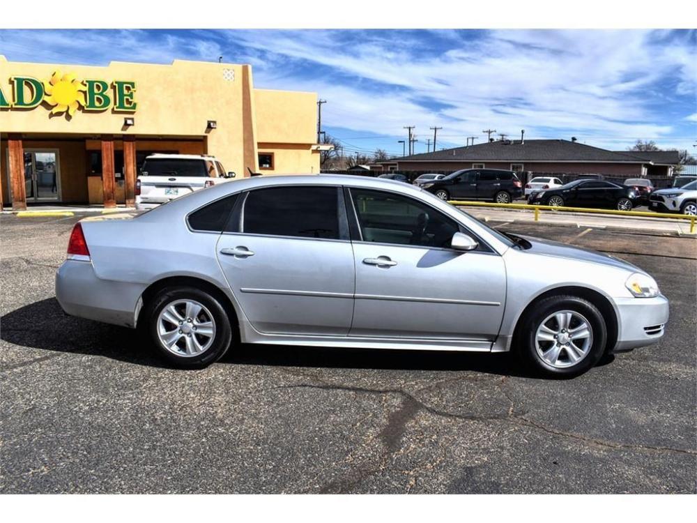 2013 SILVER ICE METALLIC /GRAY CLOTH INTERIOR Chevrolet Impala 4dr Sdn LS Retail (2G1WA5E35D1) with an 3.6L V6 DOHC 16V FFV engine, 6-SPEED AUTOMATIC transmission, located at 4711 Ave Q, Lubbock, TX, 79412, (806) 687-2362, 33.551304, -101.855293 - Photo #5