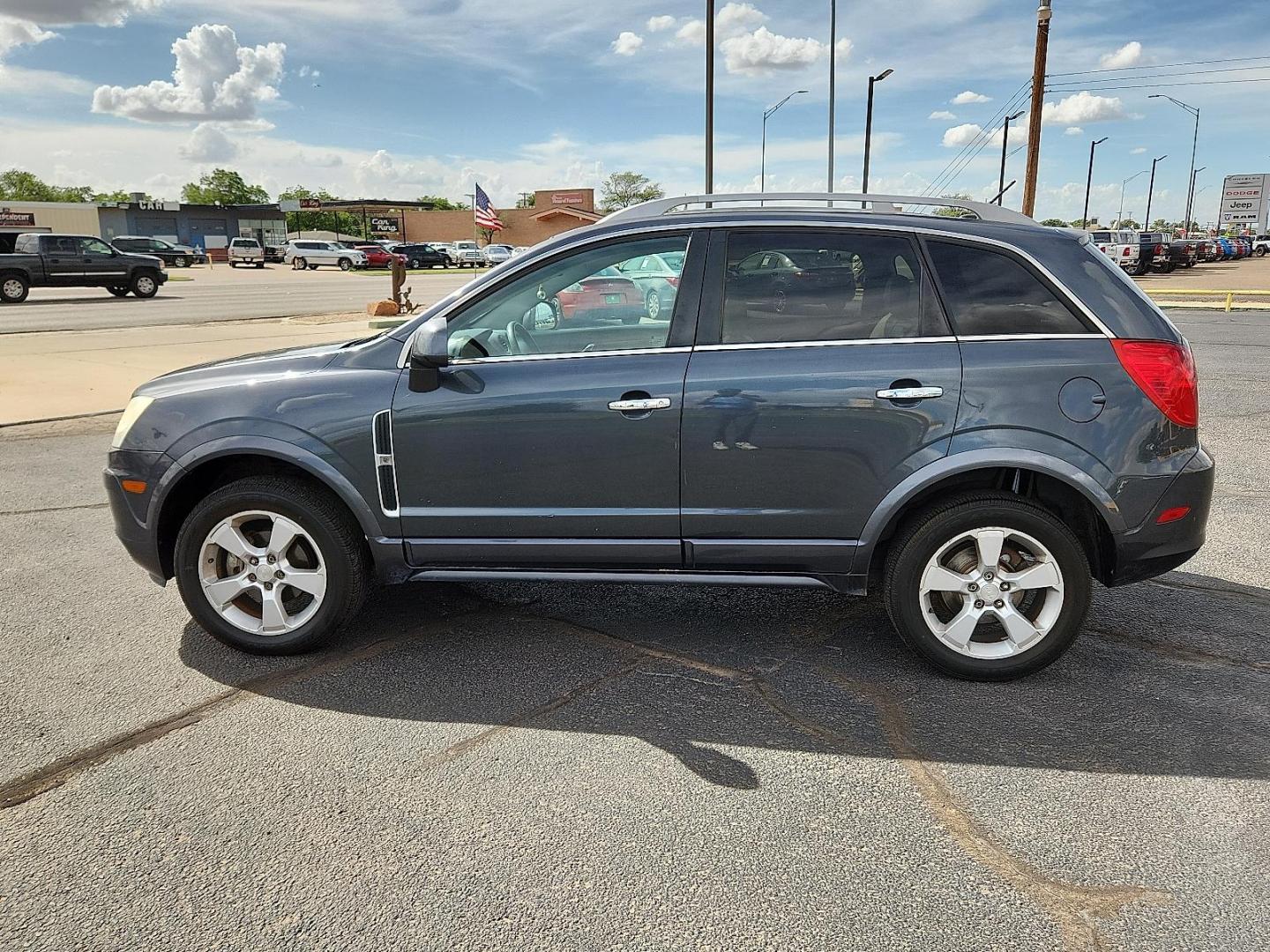 2013 GRAY Chevrolet Captiva Sport LTZ (3GNAL4EK6DS) with an ECOTEC 2.4L I-4 gasoline direct injection, DOHC, variable valve control, regular unleaded, engine with 180HP engine, located at 4711 Ave Q, Lubbock, TX, 79412, (806) 687-2362, 33.551304, -101.855293 - Photo#1