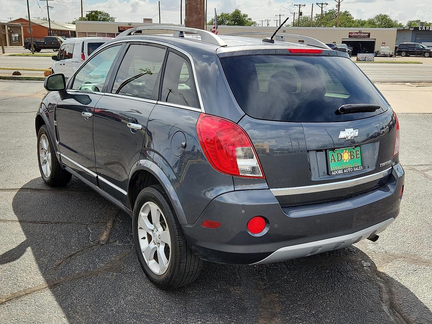 2013 GRAY Chevrolet Captiva Sport LTZ (3GNAL4EK6DS) with an ECOTEC 2.4L I-4 gasoline direct injection, DOHC, variable valve control, regular unleaded, engine with 180HP engine, located at 4711 Ave Q, Lubbock, TX, 79412, (806) 687-2362, 33.551304, -101.855293 - Photo#2