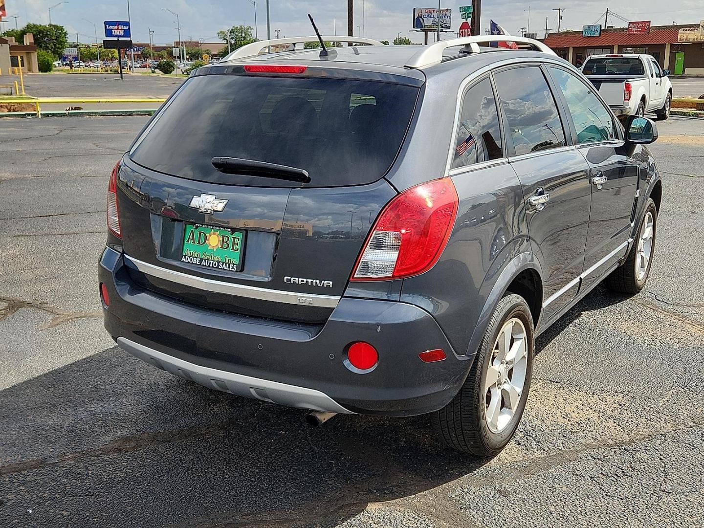 2013 GRAY Chevrolet Captiva Sport LTZ (3GNAL4EK6DS) with an ECOTEC 2.4L I-4 gasoline direct injection, DOHC, variable valve control, regular unleaded, engine with 180HP engine, located at 4711 Ave Q, Lubbock, TX, 79412, (806) 687-2362, 33.551304, -101.855293 - Photo#3