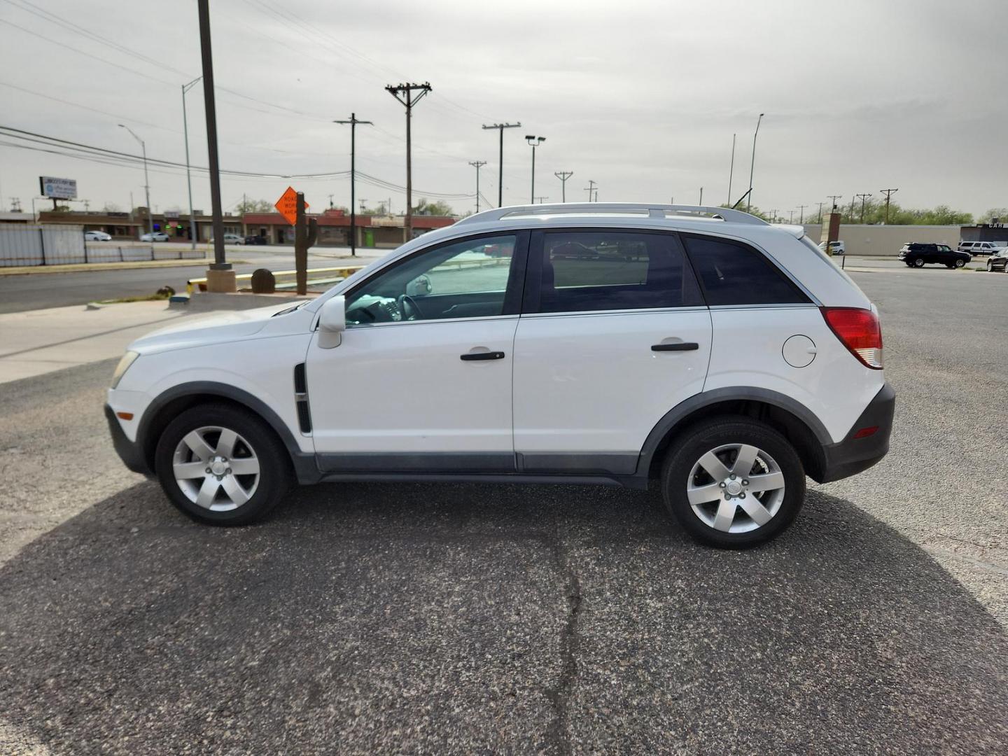 2012 Arctic Ice /Black Chevrolet Captiva Sport 2LS (3GNAL2EK3CS) with an Ecotec 2.4L I-4 gasoline direct injection, DOHC, variable valve control, regular unleaded, engine with 182HP engine, located at 4711 Ave Q, Lubbock, TX, 79412, (806) 687-2362, 33.551304, -101.855293 - Photo#1