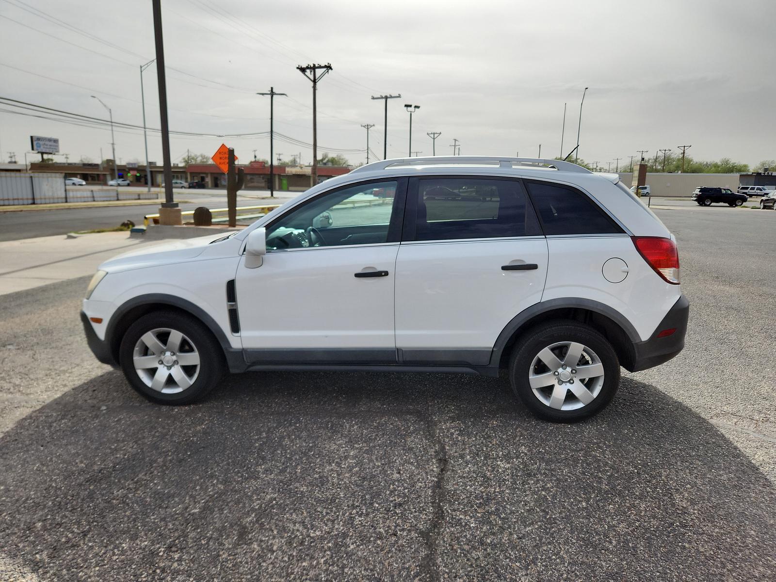 2012 Arctic Ice /Black Chevrolet Captiva Sport Fleet LS w/2LS (3GNAL2EK3CS) with an ENGINE, 2.4L DOHC 4-CYLINDER SIDI (SPARK IGNITION DIRECT INJECTION) engine, located at 4711 Ave Q, Lubbock, TX, 79412, (806) 687-2362, 33.551304, -101.855293 - Photo #1