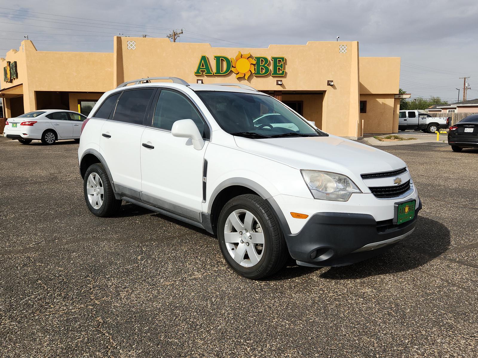 2012 Arctic Ice /Black Chevrolet Captiva Sport Fleet LS w/2LS (3GNAL2EK3CS) with an ENGINE, 2.4L DOHC 4-CYLINDER SIDI (SPARK IGNITION DIRECT INJECTION) engine, located at 4711 Ave Q, Lubbock, TX, 79412, (806) 687-2362, 33.551304, -101.855293 - Photo #6