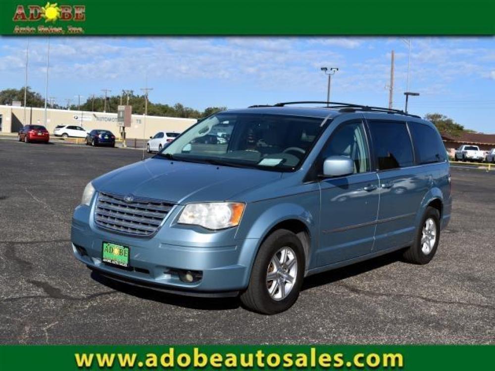 2009 MODERN BLUE PEARL /MEDIUM SLATE GRAY/LIGHT SHALE CLOTH INTERIOR Chrysler Town and Country 4dr Wgn Touring (2A8HR54159R) with an 3.8L V6 OHV 12V engine, 6-SPEED AUTOMATIC transmission, located at 4711 Ave Q, Lubbock, TX, 79412, (806) 687-2362, 33.551304, -101.855293 - Photo #0