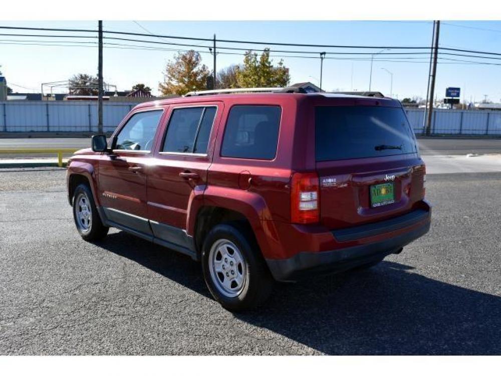 2011 DEEP CHERRY RED CRYSTAL PEARL /DARK SLATE GRAY CLOTH INTERIOR Jeep PATRIOT FWD 4dr Sport (1J4NT1GB8BD) with an 4 Cylinder Engine engine, located at 4711 Ave Q, Lubbock, TX, 79412, (806) 687-2362, 33.551304, -101.855293 - Photo #2