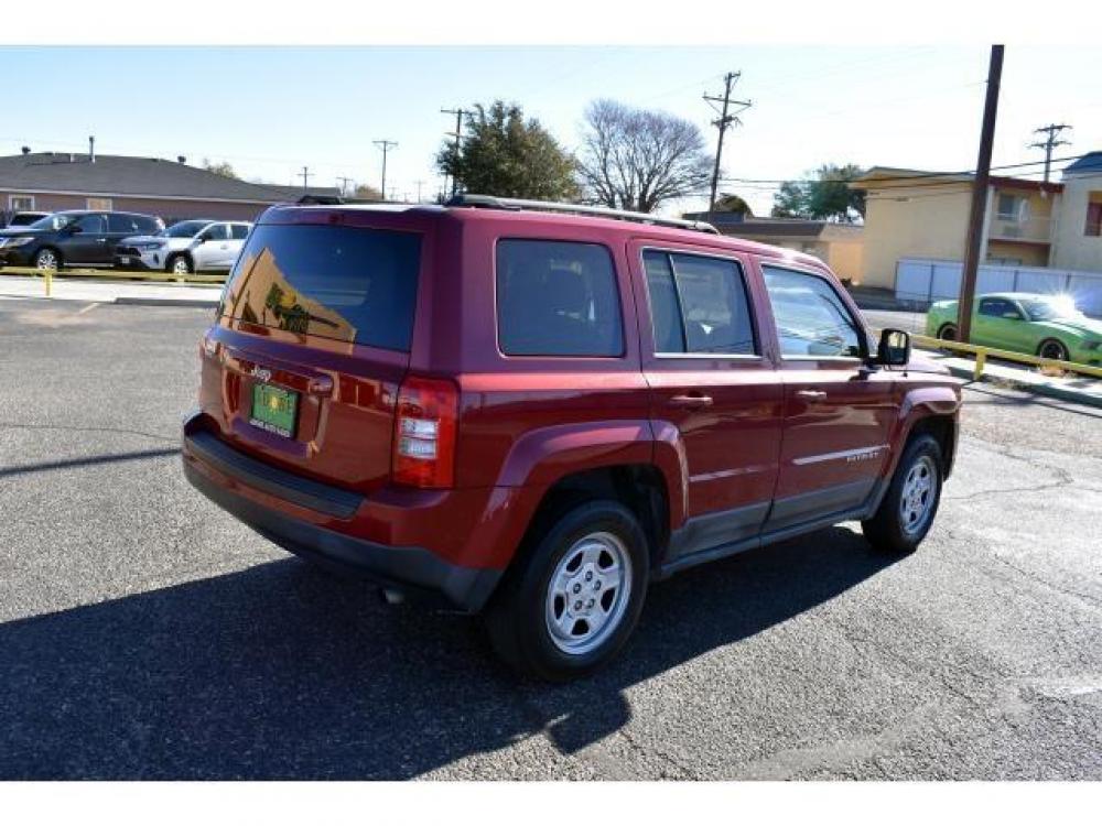 2011 DEEP CHERRY RED CRYSTAL PEARL /DARK SLATE GRAY CLOTH INTERIOR Jeep PATRIOT FWD 4dr Sport (1J4NT1GB8BD) with an 4 Cylinder Engine engine, located at 4711 Ave Q, Lubbock, TX, 79412, (806) 687-2362, 33.551304, -101.855293 - Photo #4