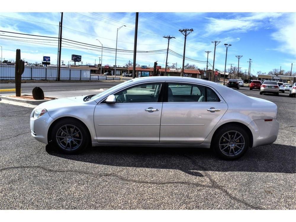 2012 SILVER ICE METALLIC /EBONY CLOTH INTERIOR Chevrolet Malibu 4dr Sdn LT w/1LT (1G1ZC5E01CF) with an 2.4L L4 DOHC 16V engine, 6-SPEED AUTOMATIC transmission, located at 4711 Ave Q, Lubbock, TX, 79412, (806) 687-2362, 33.551304, -101.855293 - Photo #1