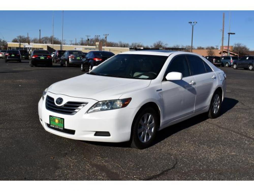 2008 SUPER WHITE /BISQUE CLOTH INTERIOR Toyota Camry Hybrid 4dr Sdn (Natl) (4T1BB46K08U) with an 2.4L L4 DOHC 16V HYBRID engine, CONTINUOUSLY VARIABLE TRANSMISSION transmission, located at 4711 Ave Q, Lubbock, TX, 79412, (806) 687-2362, 33.551304, -101.855293 - Photo #0