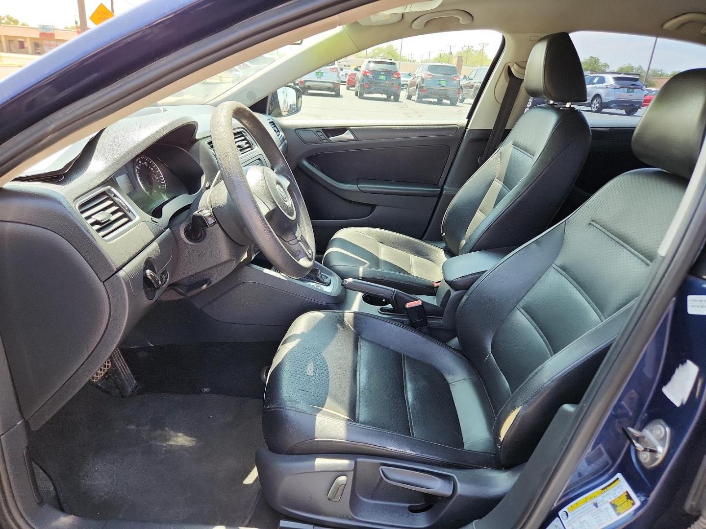 2014 Tempest Blue Metallic /Titan Black Volkswagen Jetta Sedan SE (3VWD17AJ9EM) with an Engine: 1.8L l-4 DOHC engine, located at 4711 Ave Q, Lubbock, TX, 79412, (806) 687-2362, 33.551304, -101.855293 - Photo#12