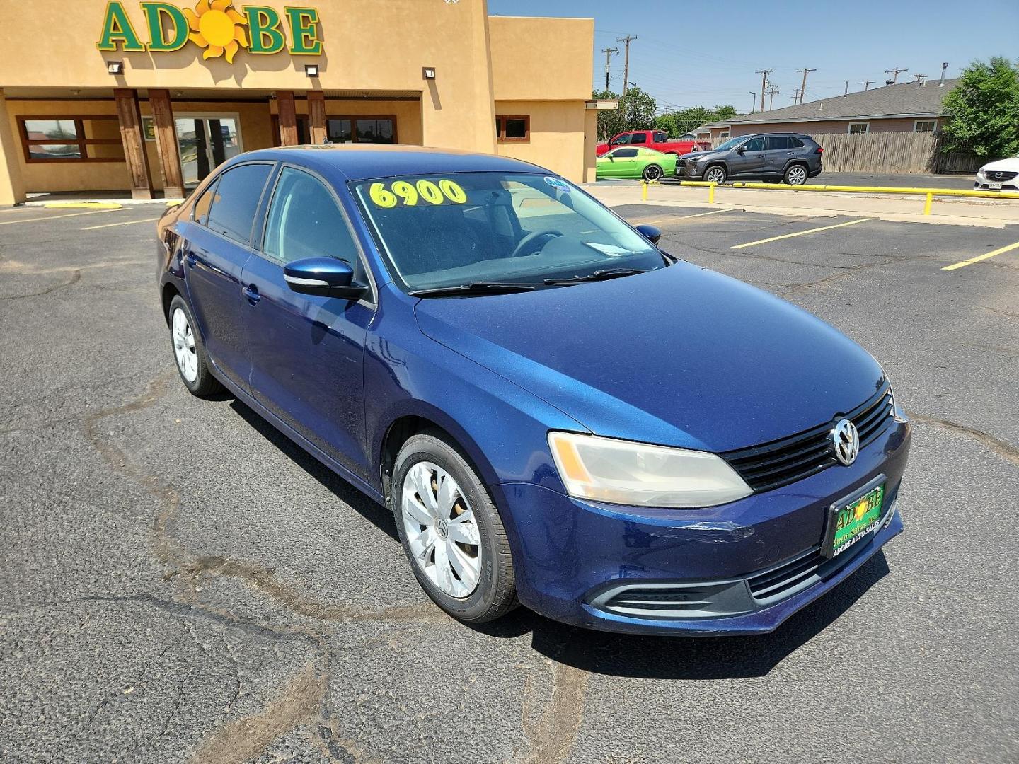 2014 Tempest Blue Metallic /Titan Black Volkswagen Jetta Sedan SE (3VWD17AJ9EM) with an Engine: 1.8L l-4 DOHC engine, located at 4711 Ave Q, Lubbock, TX, 79412, (806) 687-2362, 33.551304, -101.855293 - Photo#6