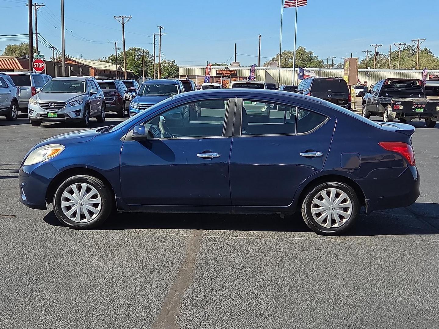 2014 Blue Onyx - B23 /Charcoal - G Nissan Versa 1.6 SV (3N1CN7AP0EL) with an 1.6L I-4 DOHC, variable valve control, regular unleaded, engine with 109HP engine, located at 4711 Ave Q, Lubbock, TX, 79412, (806) 687-2362, 33.551304, -101.855293 - Photo#1