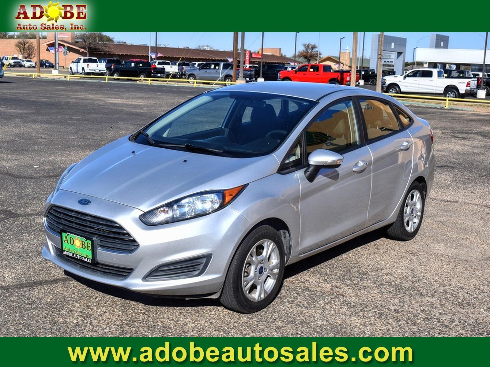 2015 INGOT SILVER METALLIC /CHARCOAL BLACK Ford Fiesta (3FADP4BJ6FM) with an 1.6L L4 DOHC 16V engine, located at 4711 Ave Q, Lubbock, TX, 79412, (806) 687-2362, 33.551304, -101.855293 - Photo #0