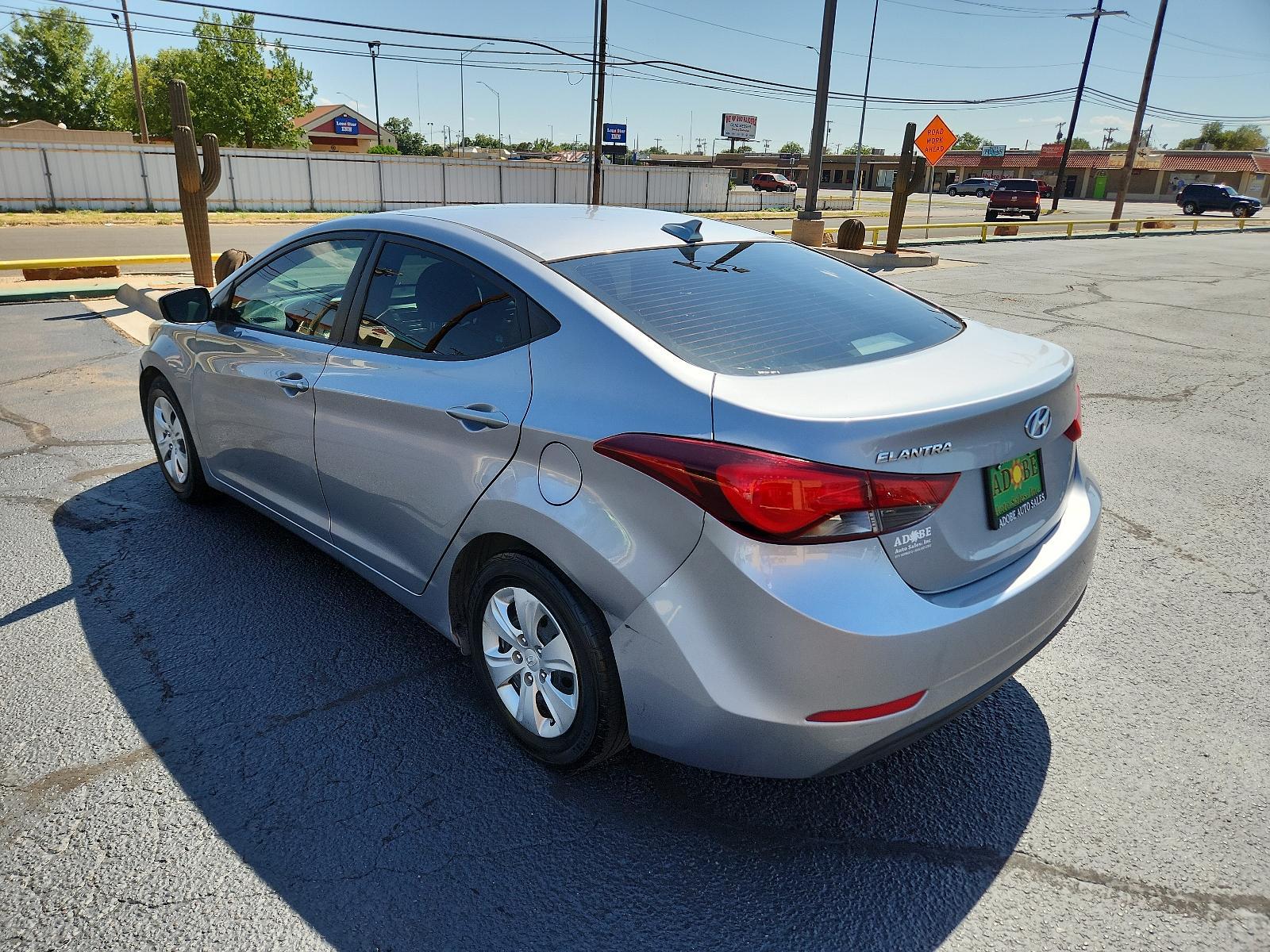 2016 Quartz White Pearl - W8 /Beige - YVF Hyundai Elantra SE (5NPDH4AE6GH) with an Engine:1.8L DOHC 16V 4-Cylinder D-CVVT MPI engine, located at 4711 Ave Q, Lubbock, TX, 79412, (806) 687-2362, 33.551304, -101.855293 - Photo #2