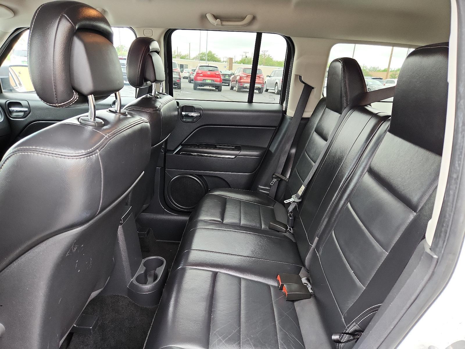 2012 Bright White /Dark Slate Gray Leather Interior Jeep Patriot Limited (1C4NJPCB9CD) with an 2.4L DOHC 16V I4 DUAL-VVT ENGINE engine, located at 4711 Ave Q, Lubbock, TX, 79412, (806) 687-2362, 33.551304, -101.855293 - Photo #16