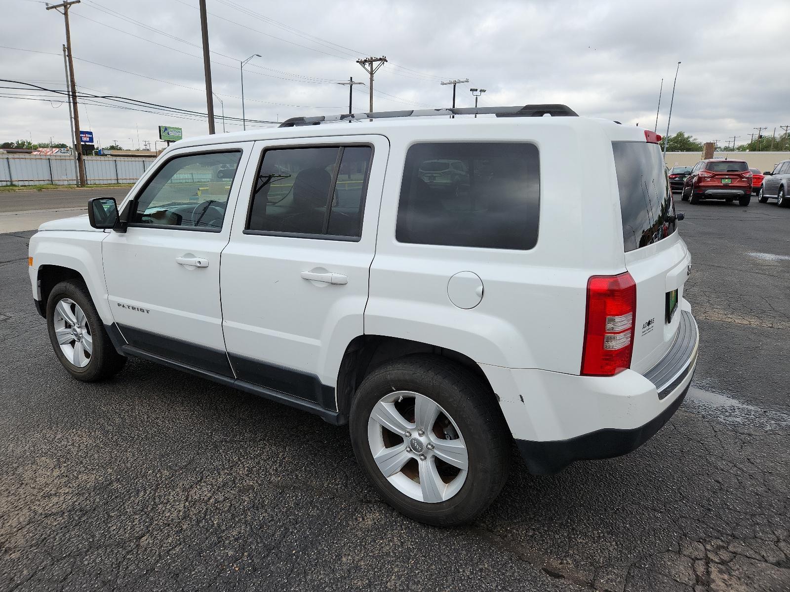 2012 Bright White /Dark Slate Gray Leather Interior Jeep Patriot Limited (1C4NJPCB9CD) with an 2.4L DOHC 16V I4 DUAL-VVT ENGINE engine, located at 4711 Ave Q, Lubbock, TX, 79412, (806) 687-2362, 33.551304, -101.855293 - Photo #2