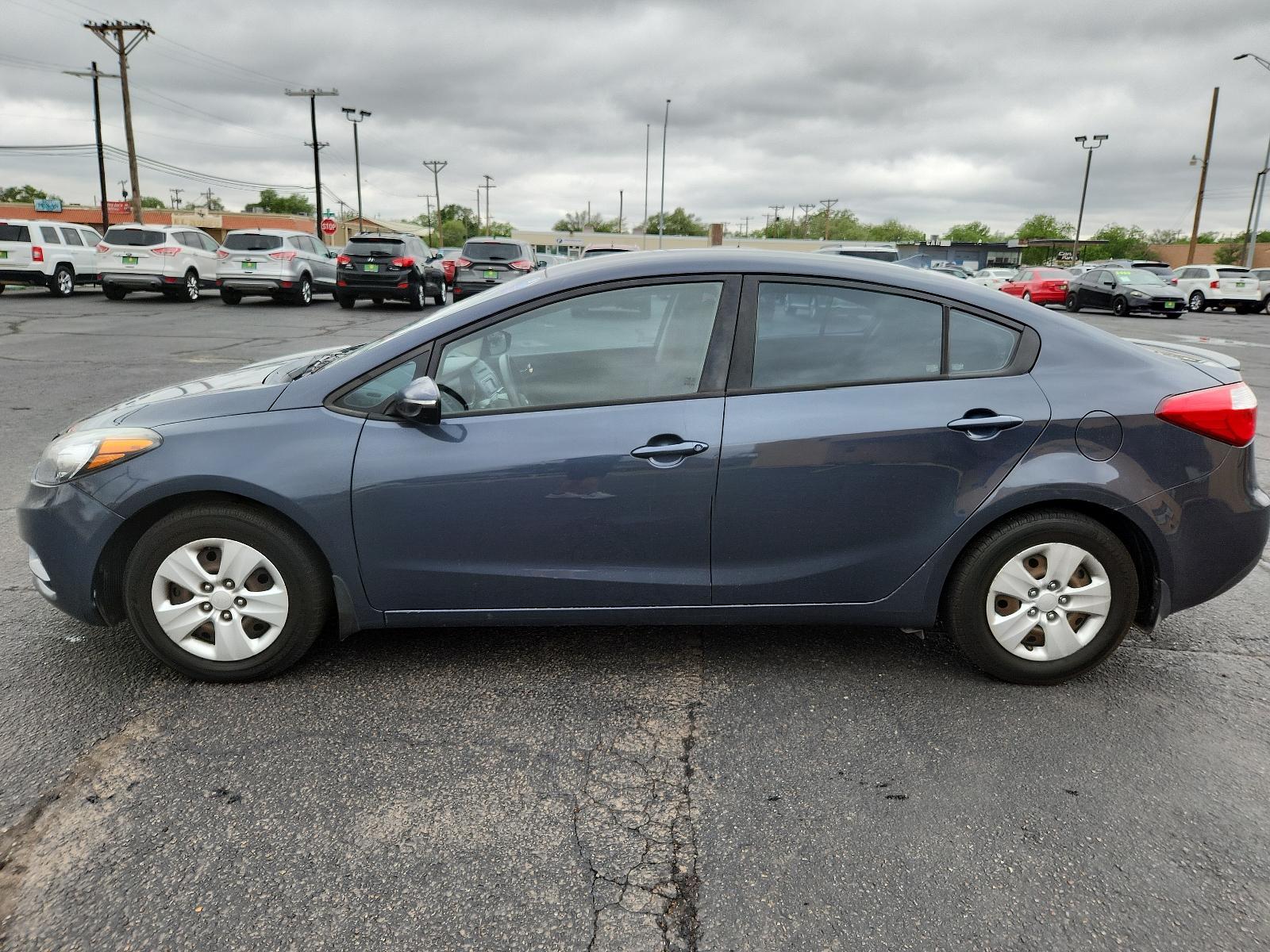 2015 Graphite Steel /Black Kia Forte LX (KNAFX4A63F5) with an Engine: 1.8L I4 DOHC D-CVVT engine, located at 4711 Ave Q, Lubbock, TX, 79412, (806) 687-2362, 33.551304, -101.855293 - Photo #1