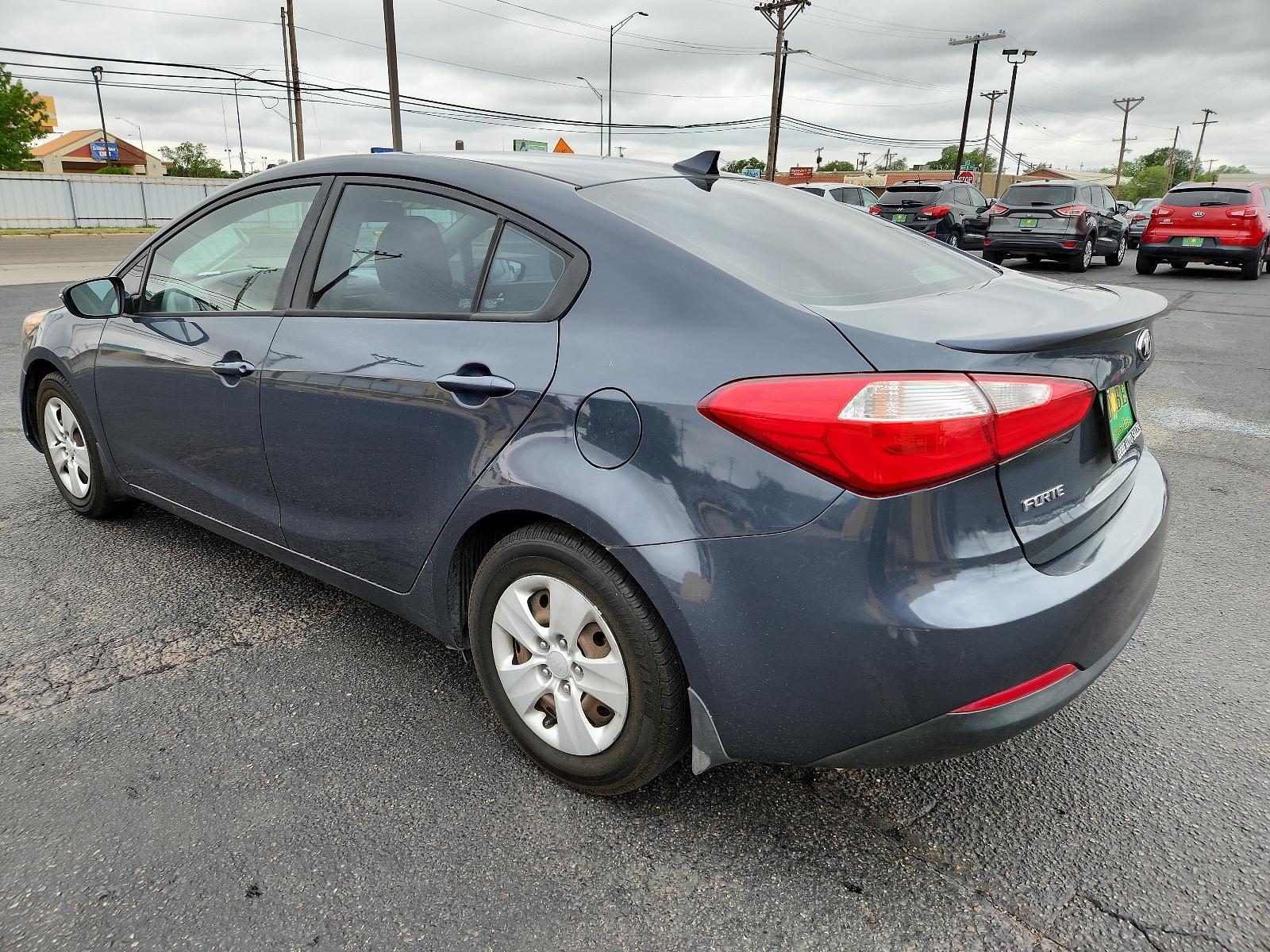 2015 Graphite Steel /Black Kia Forte LX (KNAFX4A63F5) with an Engine: 1.8L I4 DOHC D-CVVT engine, located at 4711 Ave Q, Lubbock, TX, 79412, (806) 687-2362, 33.551304, -101.855293 - Photo #2