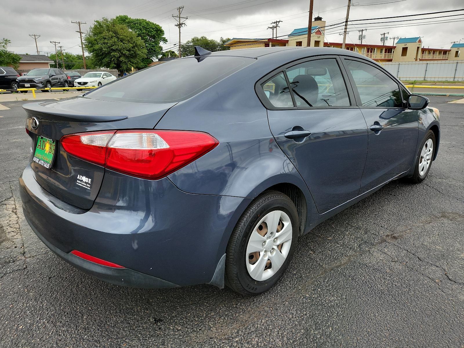 2015 Graphite Steel /Black Kia Forte LX (KNAFX4A63F5) with an Engine: 1.8L I4 DOHC D-CVVT engine, located at 4711 Ave Q, Lubbock, TX, 79412, (806) 687-2362, 33.551304, -101.855293 - Photo #4