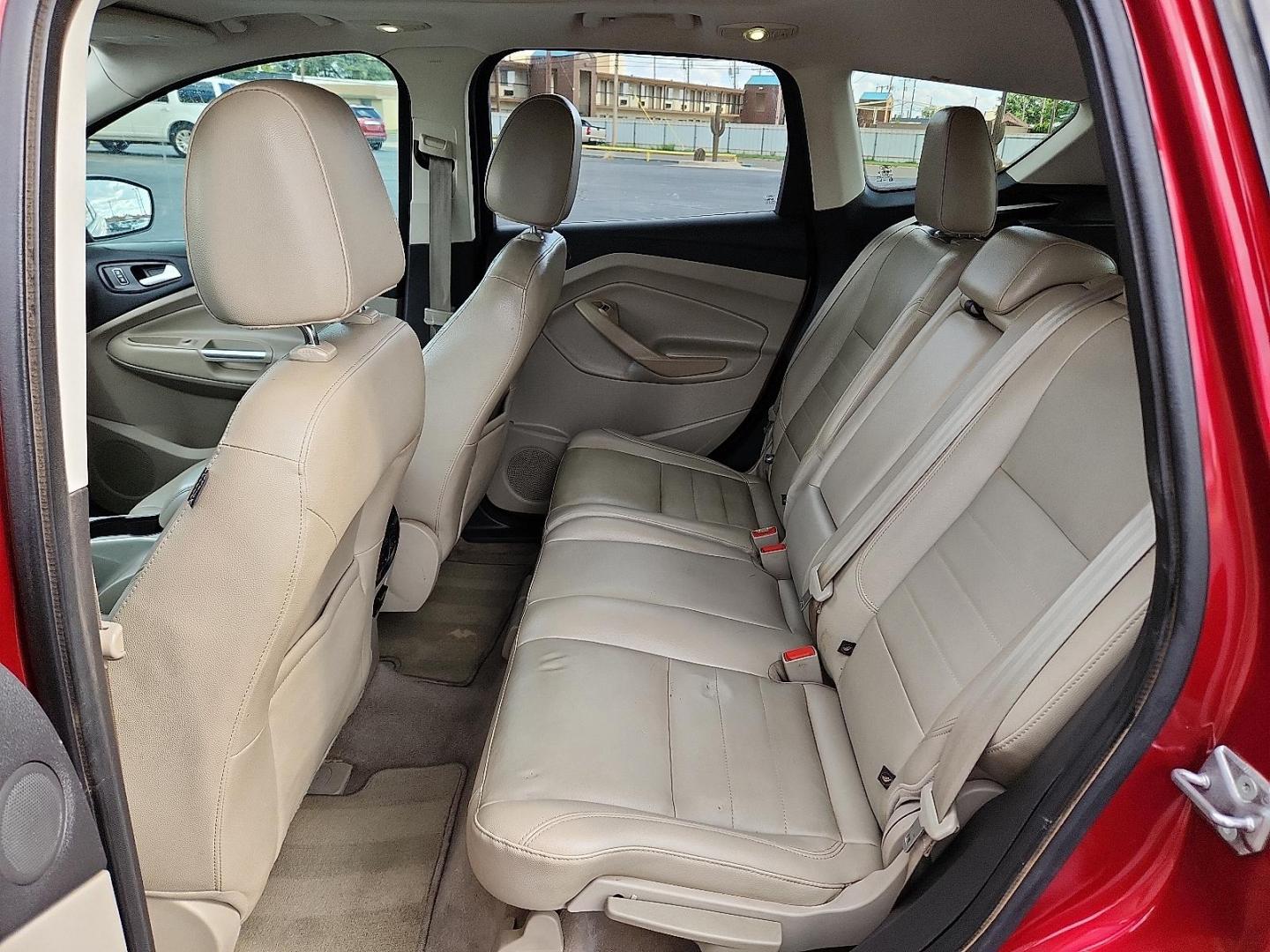 2013 Ruby Red Metallic Tinted Ford Escape SEL (1FMCU0H91DU) with an EcoBoost 2L I-4 gasoline direct injection, DOHC, variable valve control, intercooled turbo, regular unleaded, engine with 231HP engine, located at 4711 Ave Q, Lubbock, TX, 79412, (806) 687-2362, 33.551304, -101.855293 - Photo#8