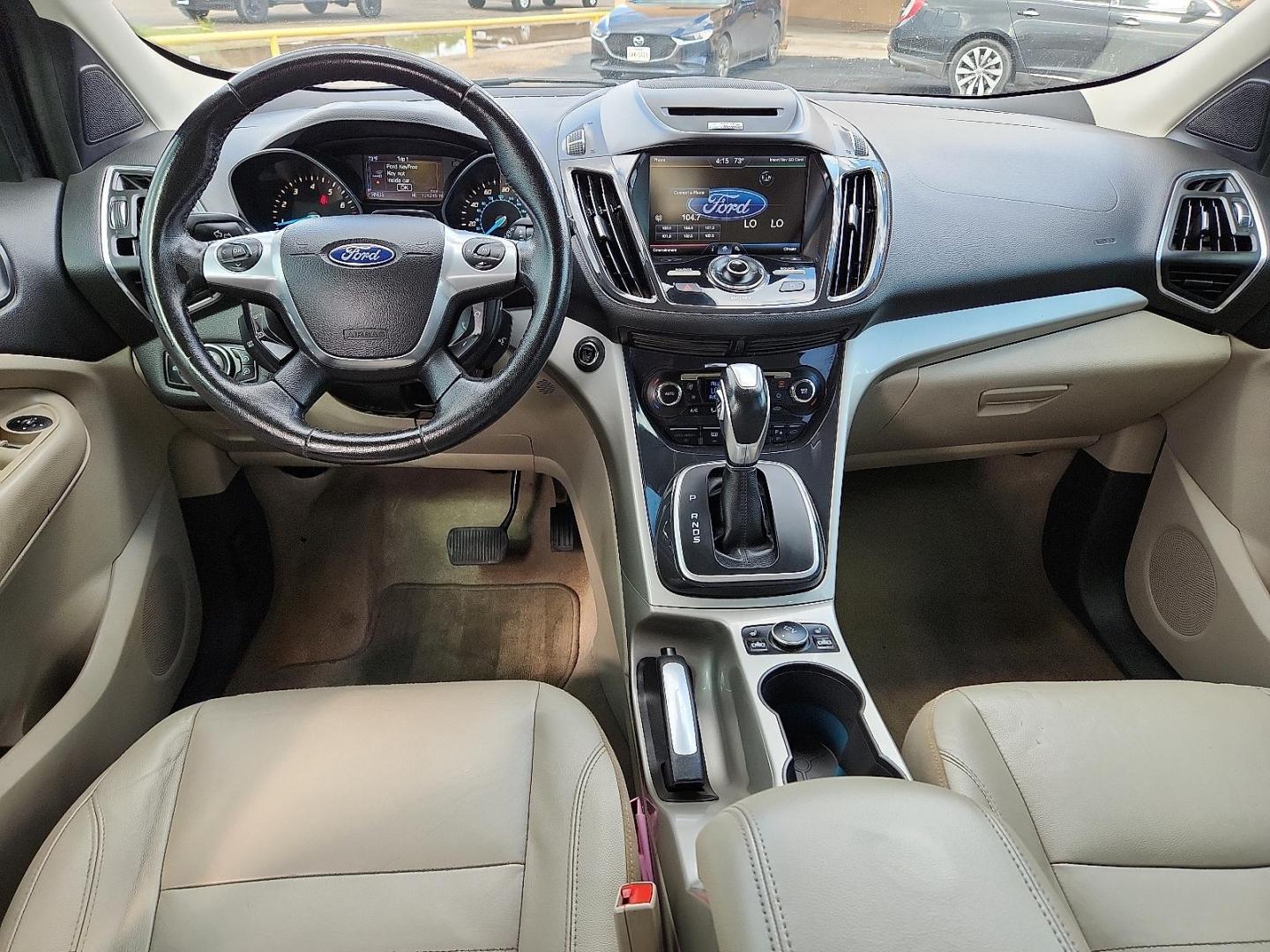 2013 Ruby Red Metallic Tinted Ford Escape SEL (1FMCU0H91DU) with an EcoBoost 2L I-4 gasoline direct injection, DOHC, variable valve control, intercooled turbo, regular unleaded, engine with 231HP engine, located at 4711 Ave Q, Lubbock, TX, 79412, (806) 687-2362, 33.551304, -101.855293 - Photo#9