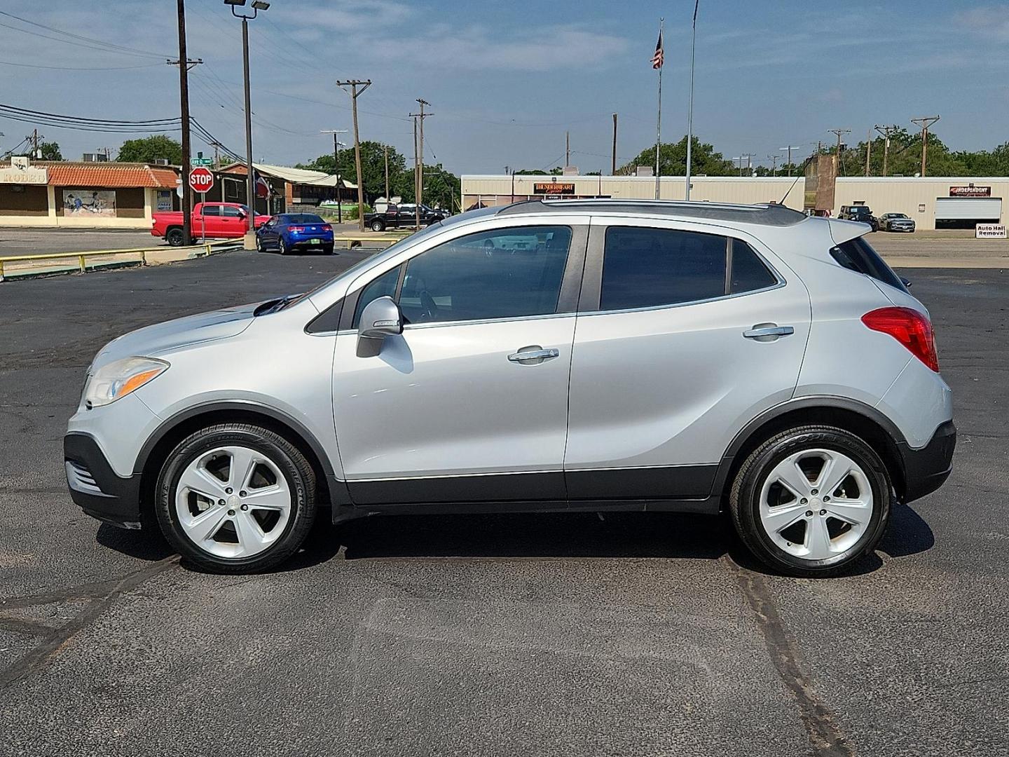 2015 Quicksilver Metallic - GAN /Titanium - AFO Buick Encore (KL4CJASB1FB) with an Ecotec 1.4L I-4 DOHC, variable valve control, intercooled turbo, regular unleaded, engine with 138HP engine, located at 4711 Ave Q, Lubbock, TX, 79412, (806) 687-2362, 33.551304, -101.855293 - Photo#1