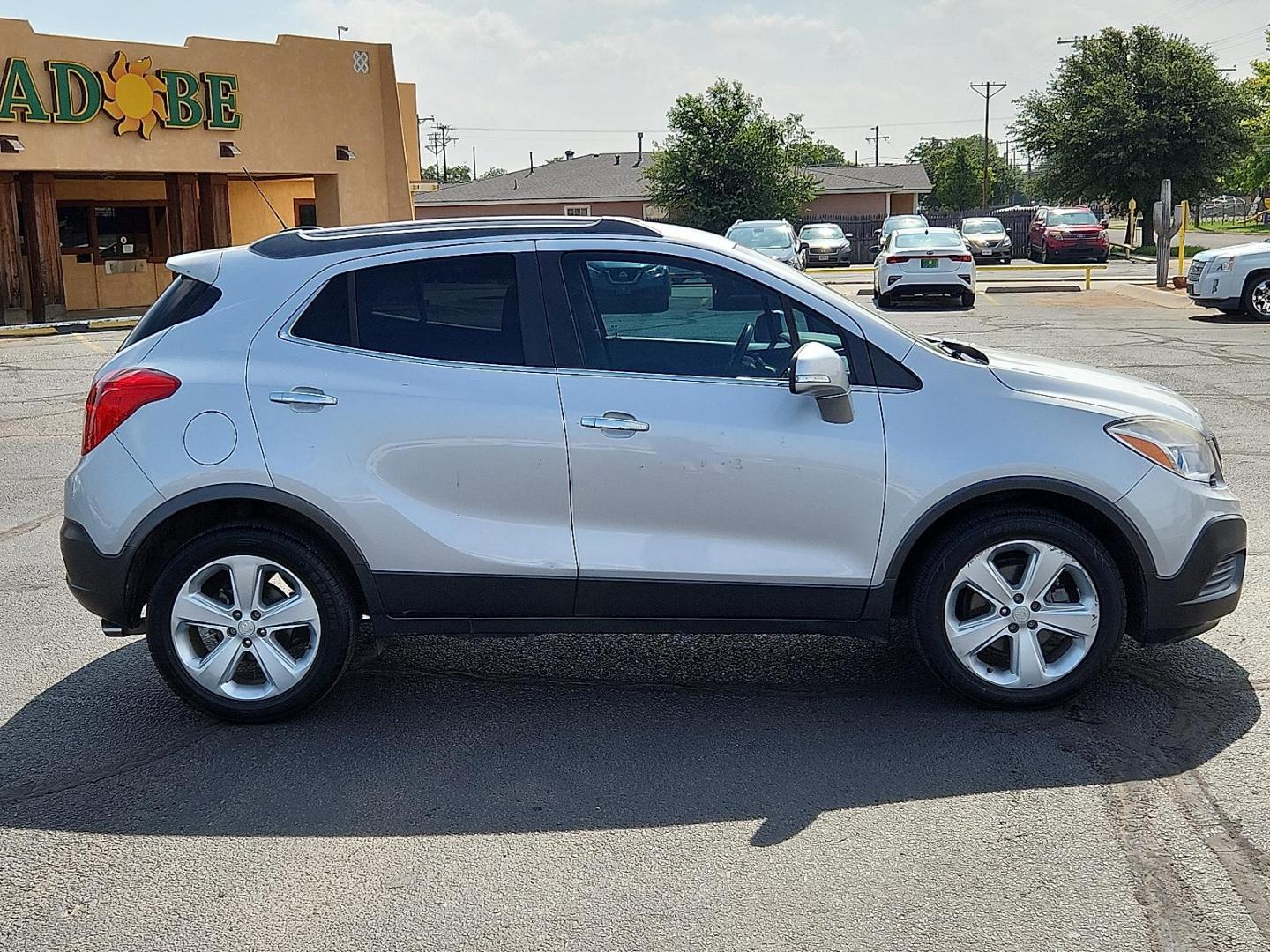 2015 Quicksilver Metallic - GAN /Titanium - AFO Buick Encore (KL4CJASB1FB) with an Ecotec 1.4L I-4 DOHC, variable valve control, intercooled turbo, regular unleaded, engine with 138HP engine, located at 4711 Ave Q, Lubbock, TX, 79412, (806) 687-2362, 33.551304, -101.855293 - Photo#4