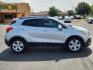 2015 Quicksilver Metallic - GAN /Titanium - AFO Buick Encore (KL4CJASB1FB) with an Ecotec 1.4L I-4 DOHC, variable valve control, intercooled turbo, regular unleaded, engine with 138HP engine, located at 4711 Ave Q, Lubbock, TX, 79412, (806) 687-2362, 33.551304, -101.855293 - Photo#4