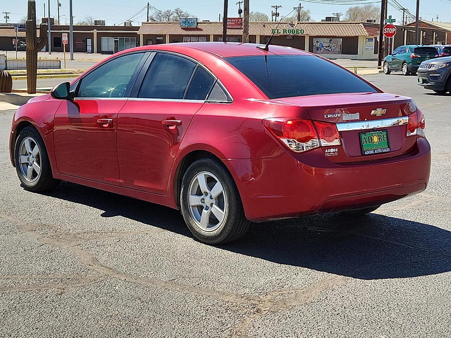 2014 RED /Jet Black - AFF Chevrolet Cruze 1LT Auto (1G1PC5SB5E7) with an ECOTEC 1.4L I-4 DOHC, VVT variable valve control, intercooled turbo, regular unleaded, engine with 138HP engine, located at 4711 Ave Q, Lubbock, TX, 79412, (806) 687-2362, 33.551304, -101.855293 - Photo#3