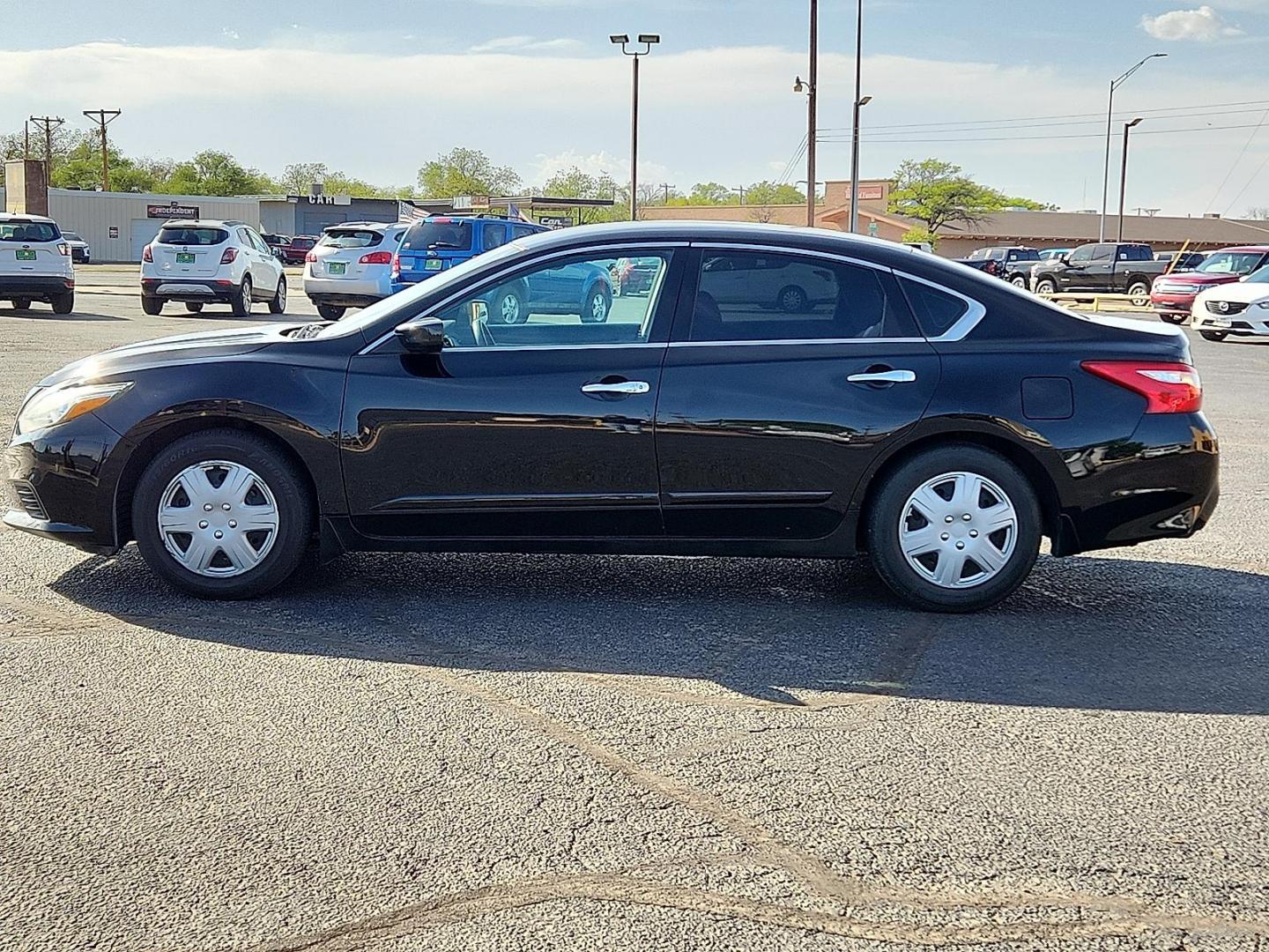 2017 BLACK /Charcoal - G Nissan Altima 2.5 S (1N4AL3AP2HC) with an 2.5L I-4 DOHC, variable valve control, regular unleaded, engine with 179HP engine, located at 4711 Ave Q, Lubbock, TX, 79412, (806) 687-2362, 33.551304, -101.855293 - Photo#1