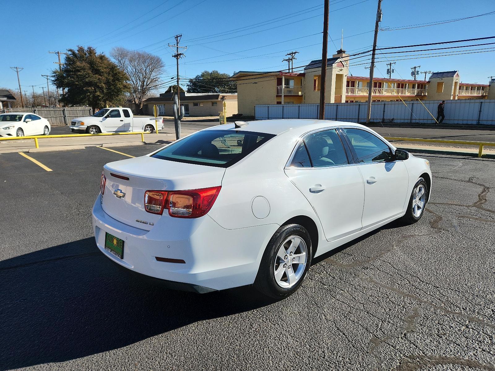 2016 White /Gray Chevrolet Malibu Limited LS (1G11A5SA6GF) with an ENGINE, 2.5L DOHC 4-CYLINDER SIDI engine, located at 4711 Ave Q, Lubbock, TX, 79412, (806) 687-2362, 33.551304, -101.855293 - Photo #4