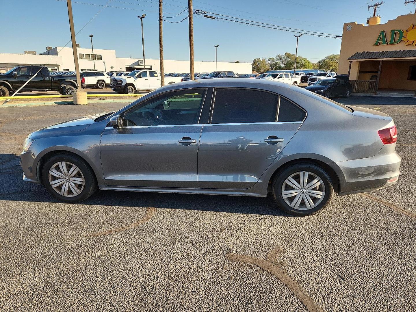 2017 GRAY Volkswagen Jetta 1.4T S (3VW2B7AJ5HM) with an 1.4L I-4 gasoline direct injection, DOHC, variable valve control, intercooled turbo, regular unleaded, engine with 150HP engine, located at 4711 Ave Q, Lubbock, TX, 79412, (806) 687-2362, 33.551304, -101.855293 - Photo#1