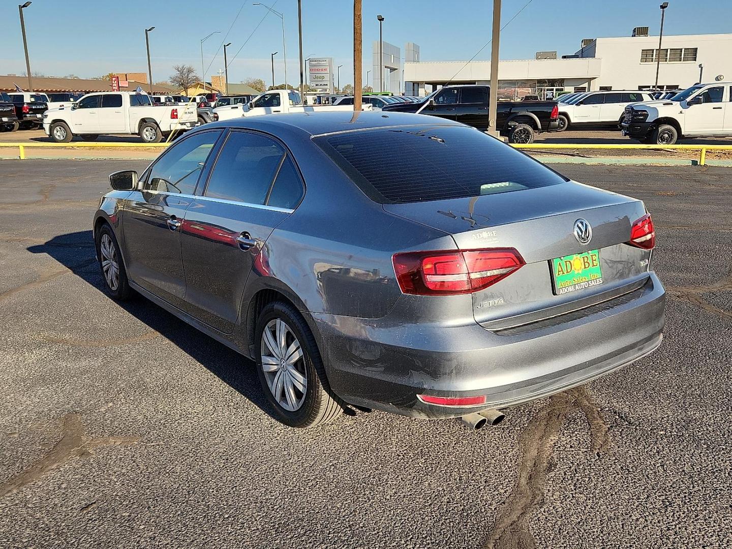 2017 GRAY Volkswagen Jetta 1.4T S (3VW2B7AJ5HM) with an 1.4L I-4 gasoline direct injection, DOHC, variable valve control, intercooled turbo, regular unleaded, engine with 150HP engine, located at 4711 Ave Q, Lubbock, TX, 79412, (806) 687-2362, 33.551304, -101.855293 - Photo#2