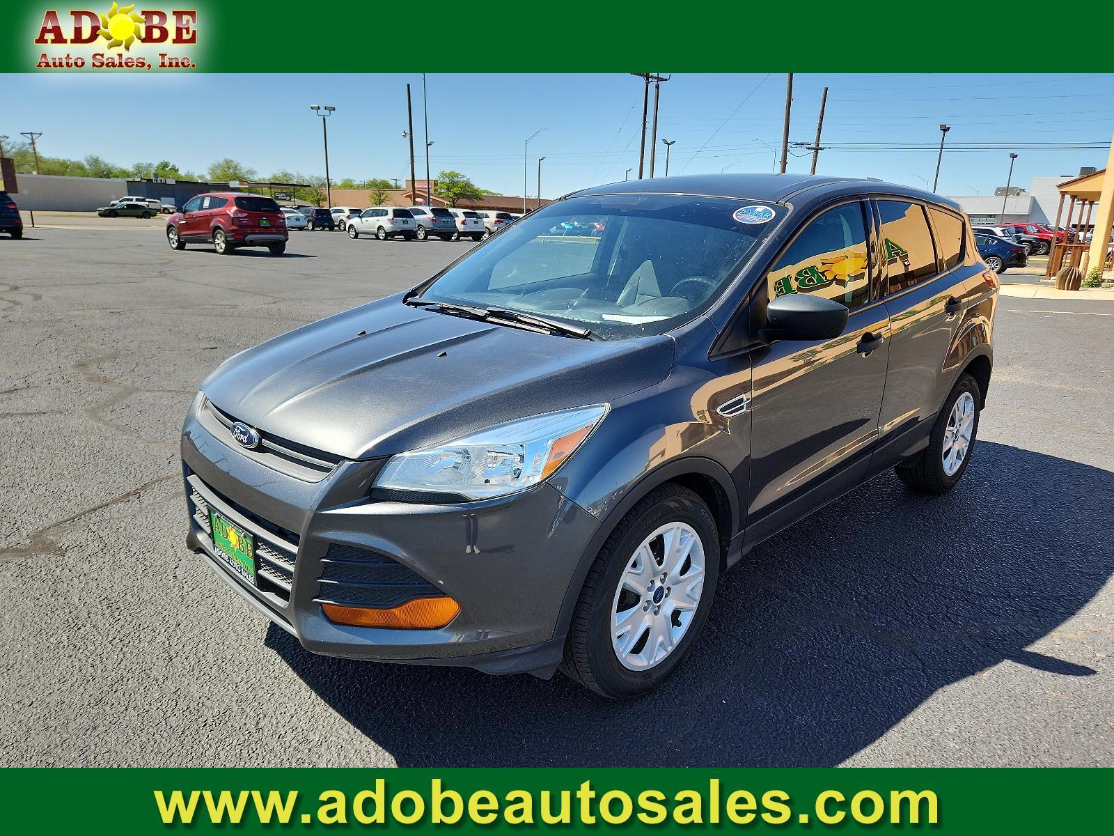2016 Magnetic Metallic /Charcoal Black, cloth Ford Escape S (1FMCU0F77GU) with an ENGINE: DURATEC 2.5L I-4 engine, located at 4711 Ave Q, Lubbock, TX, 79412, (806) 687-2362, 33.551304, -101.855293 - Photo #0