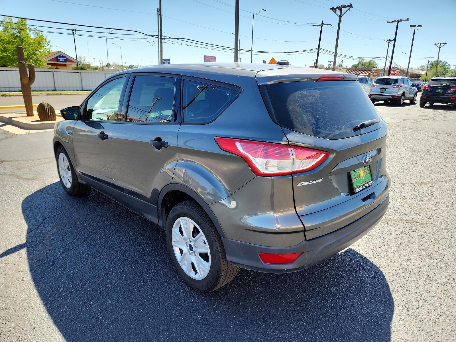 2016 Magnetic Metallic /Charcoal Black, cloth Ford Escape S (1FMCU0F77GU) with an ENGINE: DURATEC 2.5L I-4 engine, located at 4711 Ave Q, Lubbock, TX, 79412, (806) 687-2362, 33.551304, -101.855293 - Photo #2