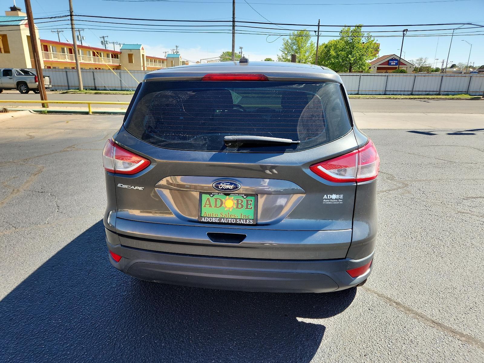 2016 Magnetic Metallic /Charcoal Black, cloth Ford Escape S (1FMCU0F77GU) with an ENGINE: DURATEC 2.5L I-4 engine, located at 4711 Ave Q, Lubbock, TX, 79412, (806) 687-2362, 33.551304, -101.855293 - Photo #3