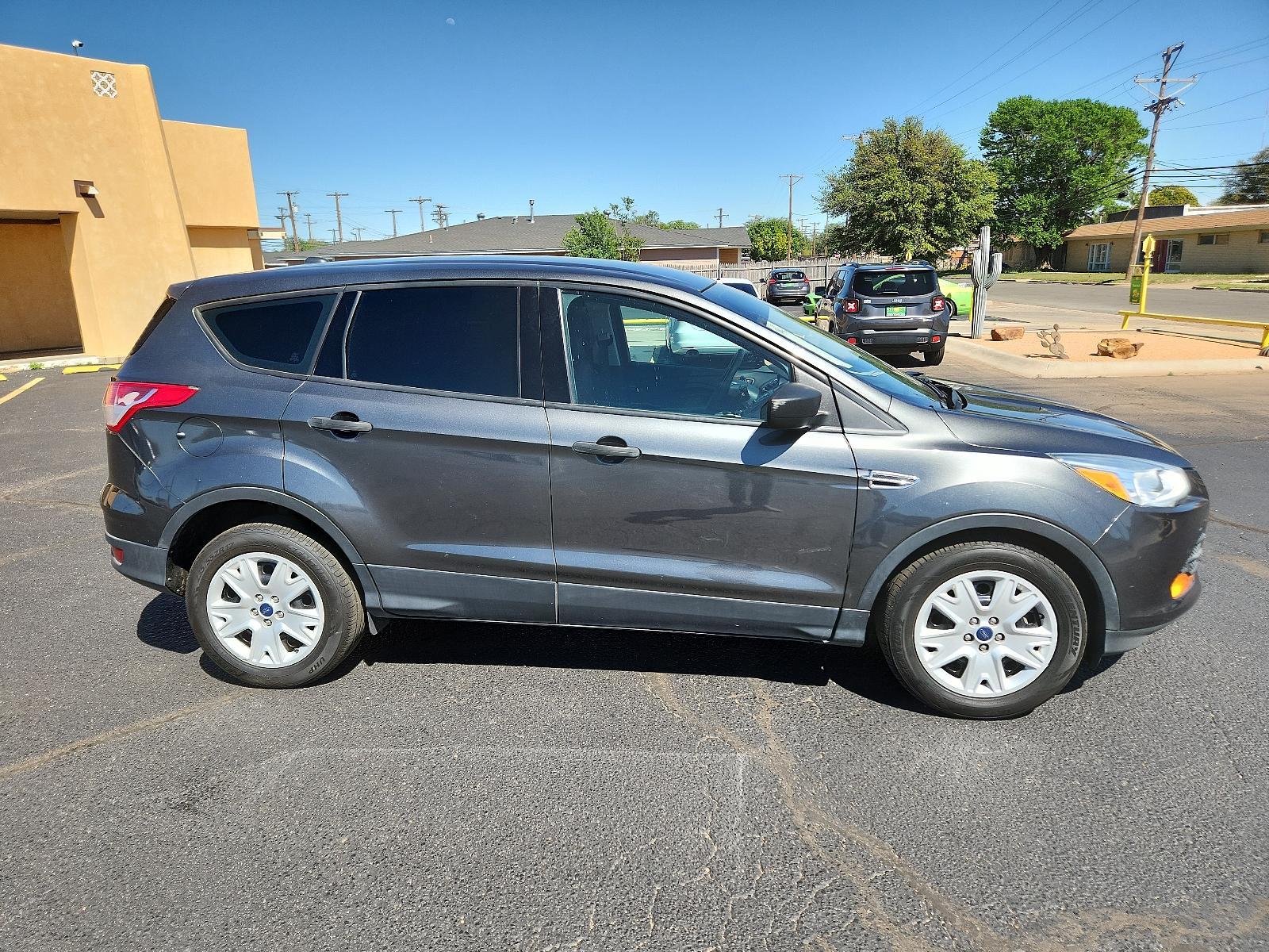 2016 Magnetic Metallic /Charcoal Black, cloth Ford Escape S (1FMCU0F77GU) with an ENGINE: DURATEC 2.5L I-4 engine, located at 4711 Ave Q, Lubbock, TX, 79412, (806) 687-2362, 33.551304, -101.855293 - Photo #5