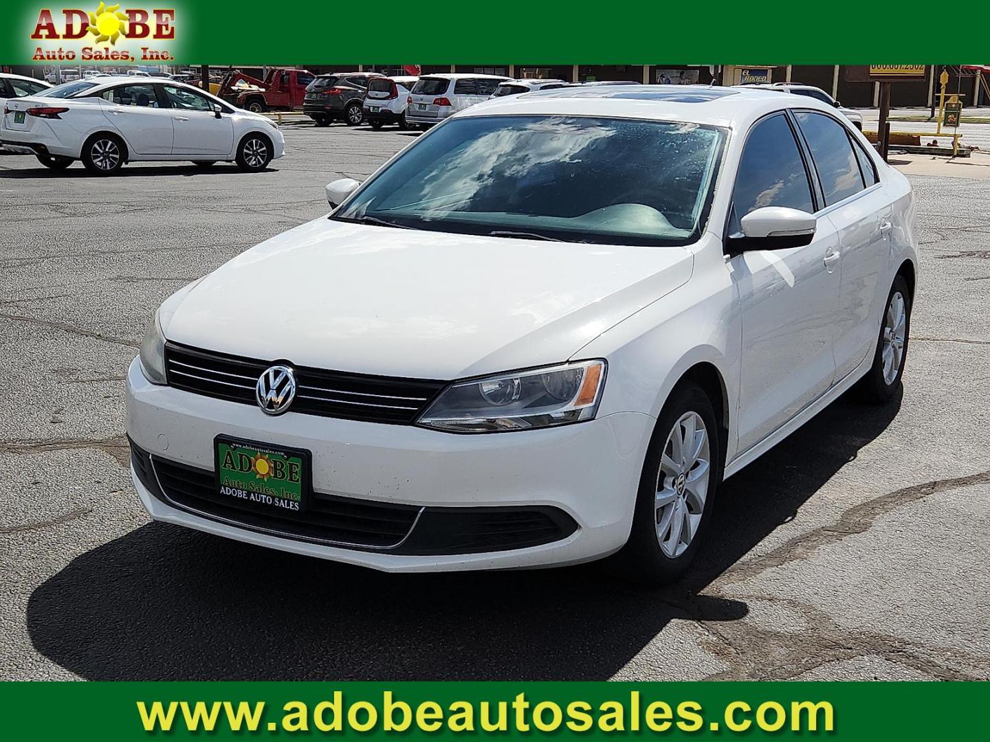 2013 Candy White - B4B4 /Titan Black - QR Volkswagen Jetta 2.5L SE (3VWDP7AJ5DM) with an 2.5L I-5 DOHC, variable valve control, regular unleaded, engine with 170HP engine, located at 4711 Ave Q, Lubbock, TX, 79412, (806) 687-2362, 33.551304, -101.855293 - Photo#0