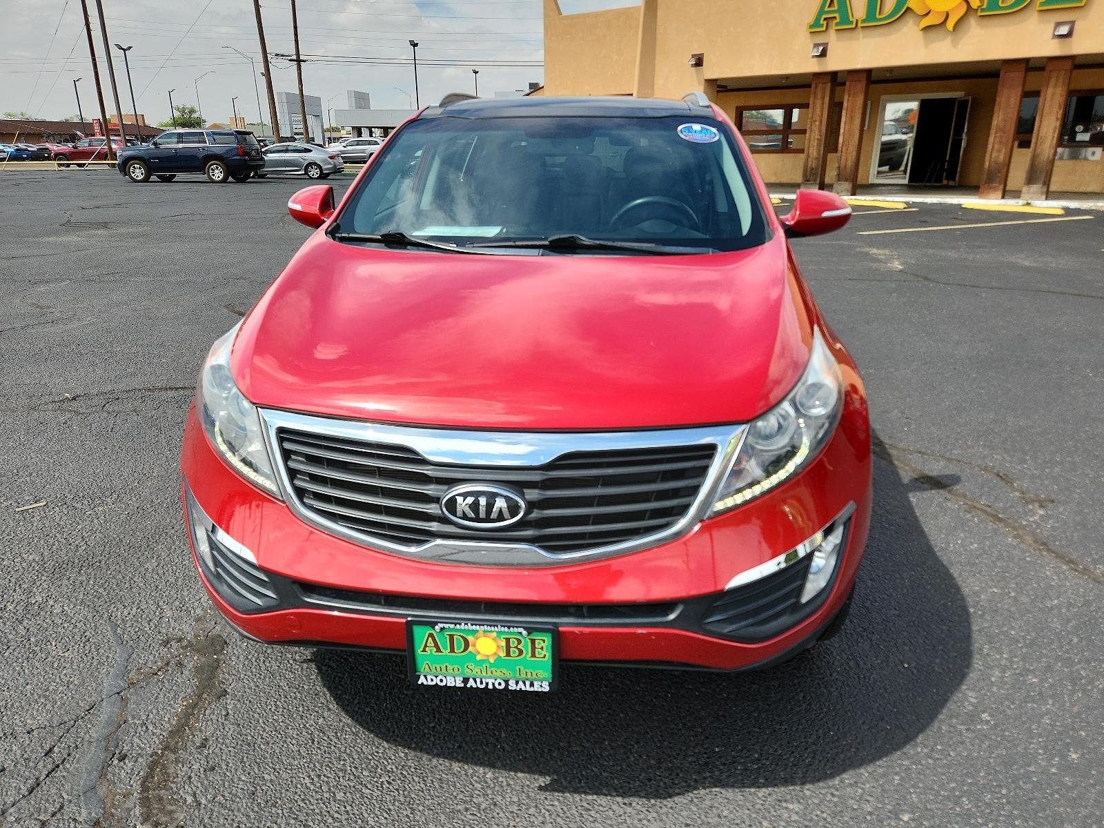 2012 Signal Red Metallic /Black Leather Interior Kia Sportage EX (KNDPC3A23C7) with an 2.4L DOHC 16-valve I4 engine engine, located at 4711 Ave Q, Lubbock, TX, 79412, (806) 687-2362, 33.551304, -101.855293 - Photo #7