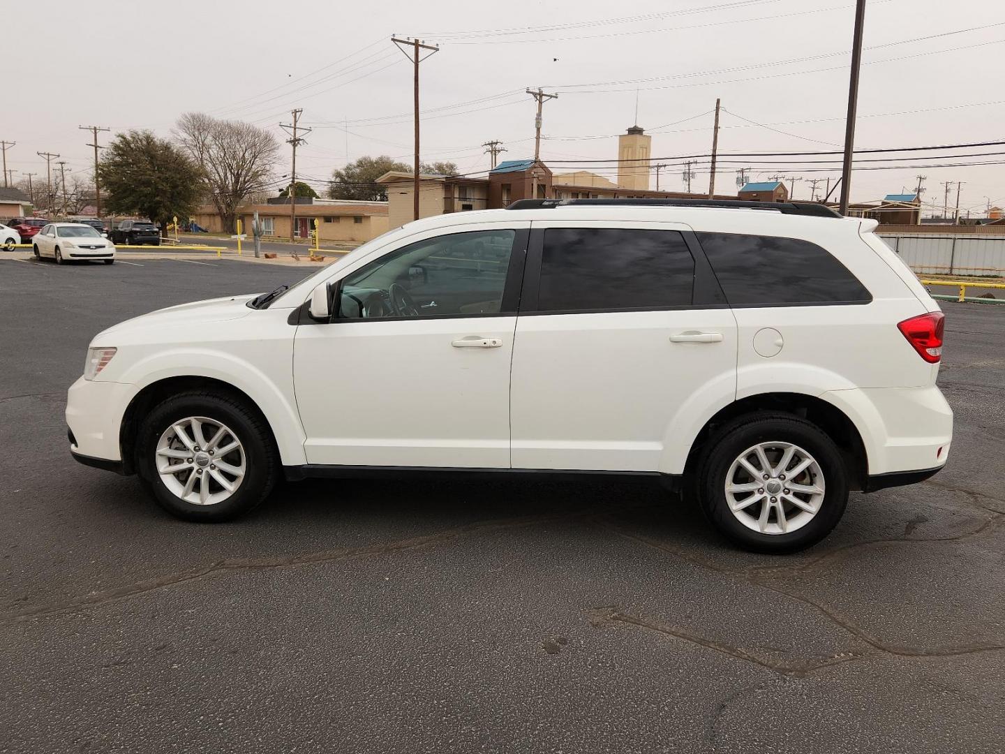 2017 Vice White - PW3 /Lt Frost Beige/Black - E5XL Dodge Journey SXT (3C4PDCBG6HT) with an ENGINE: 3.6L V6 24V VVT engine, located at 4711 Ave Q, Lubbock, TX, 79412, (806) 687-2362, 33.551304, -101.855293 - Photo#1