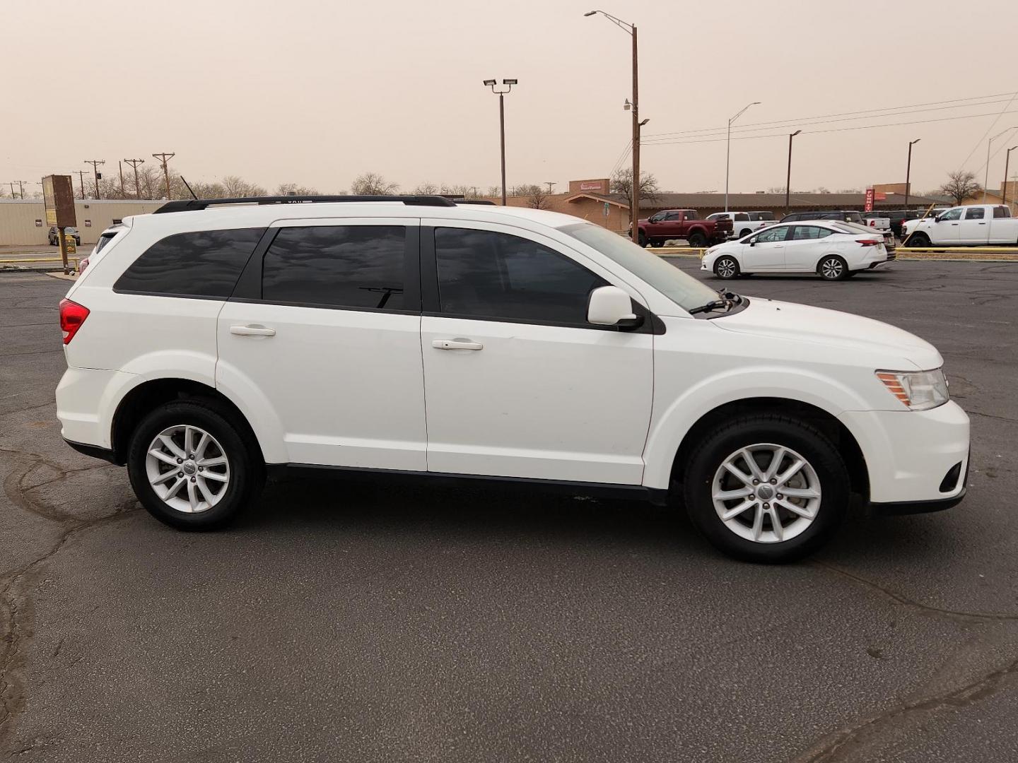 2017 Vice White - PW3 /Lt Frost Beige/Black - E5XL Dodge Journey SXT (3C4PDCBG6HT) with an ENGINE: 3.6L V6 24V VVT engine, located at 4711 Ave Q, Lubbock, TX, 79412, (806) 687-2362, 33.551304, -101.855293 - Photo#4