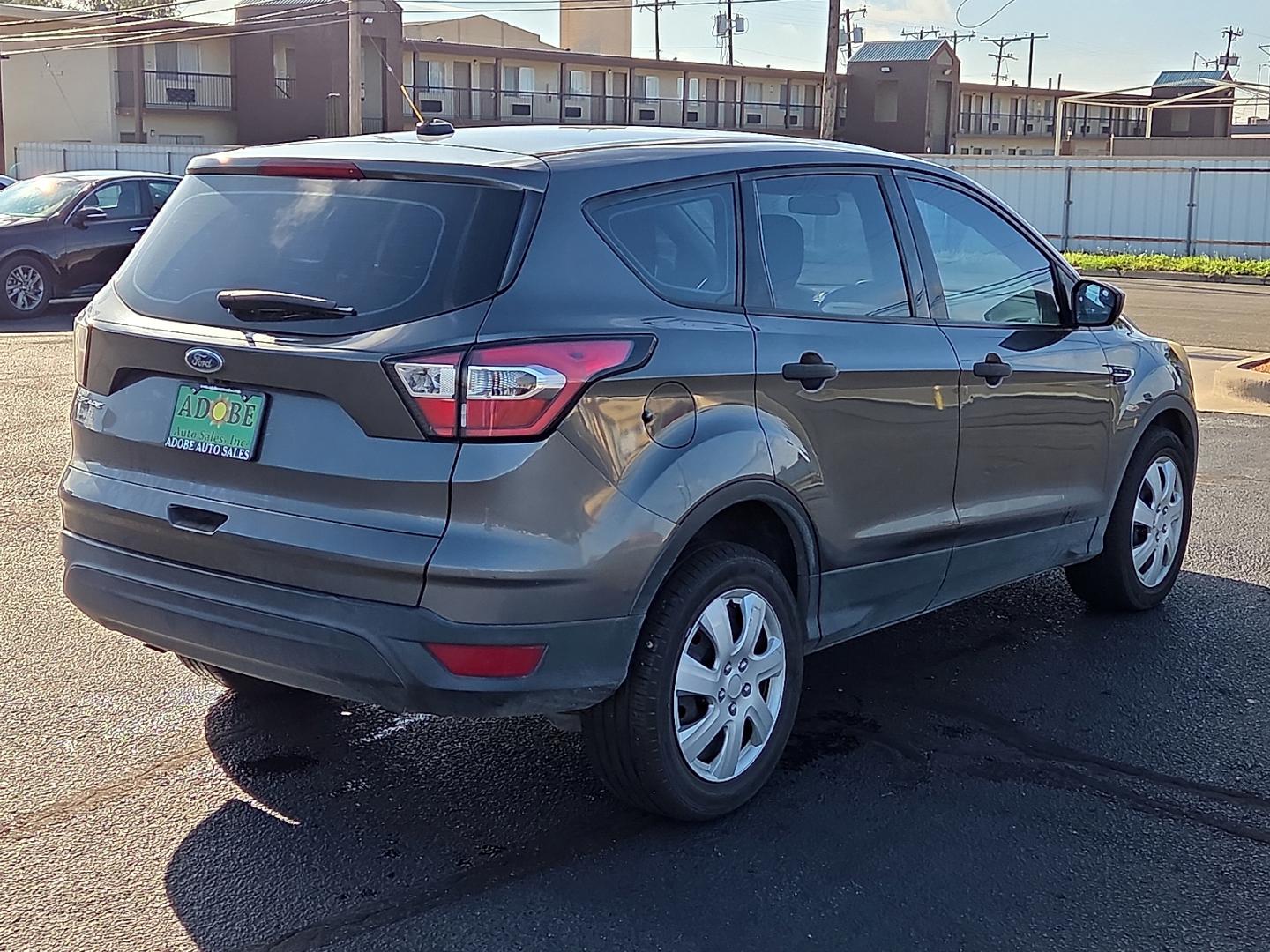 2018 Magnetic Metallic - J7 /Charcoal Black - 7B Ford Escape S (1FMCU0F77JU) with an Duratec 2.5L I-4 DOHC, iVCT variable valve control, regular gasoline, engine with 168HP engine, located at 4711 Ave Q, Lubbock, TX, 79412, (806) 687-2362, 33.551304, -101.855293- Photo#2
