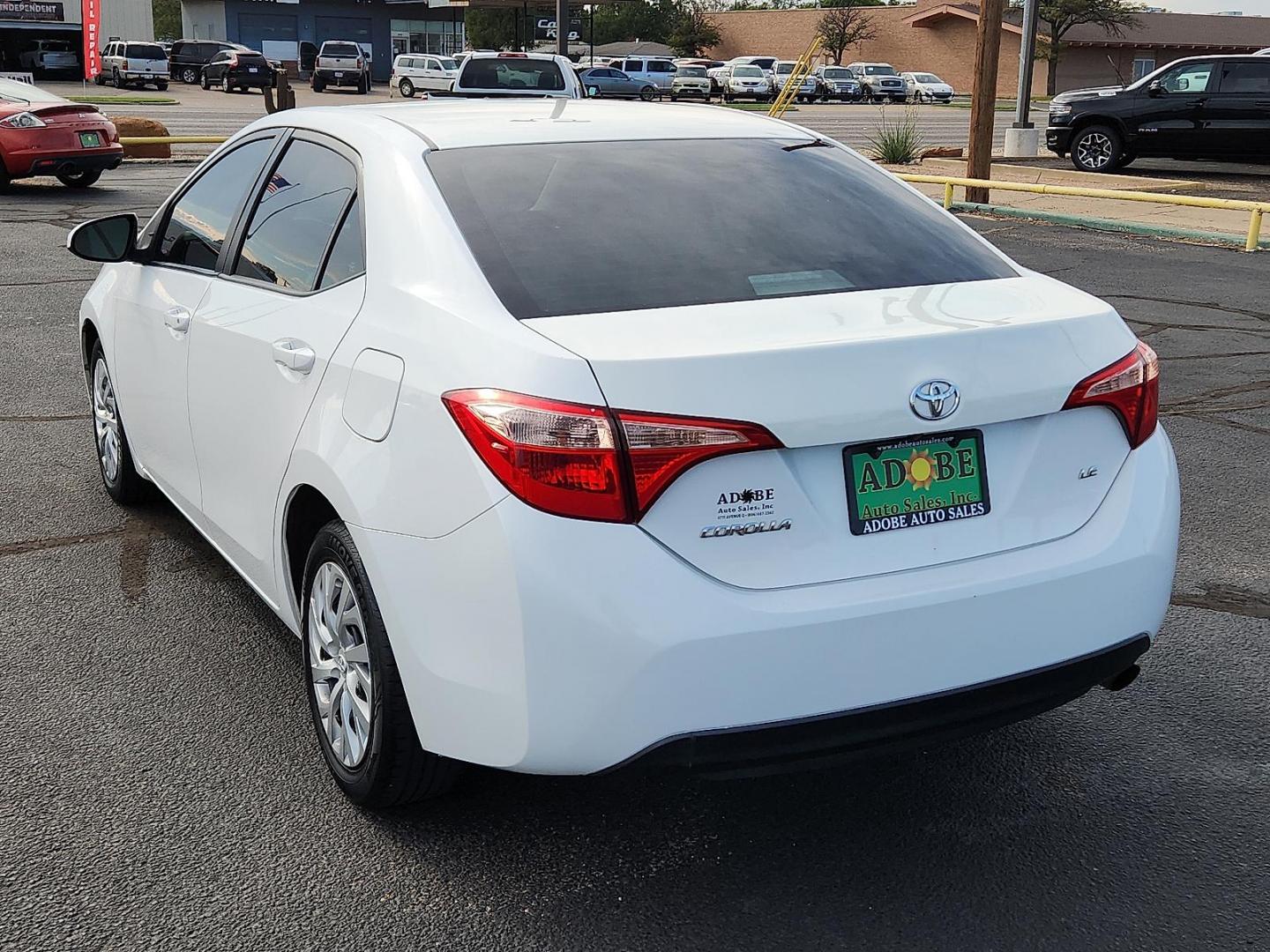 2019 WHITE Toyota Corolla LE (2T1BURHE5KC) with an 1.8L I-4 DOHC, VVT-i variable valve control, regular unleaded, engine with 132HP engine, located at 4711 Ave Q, Lubbock, TX, 79412, (806) 687-2362, 33.551304, -101.855293 - Photo#2
