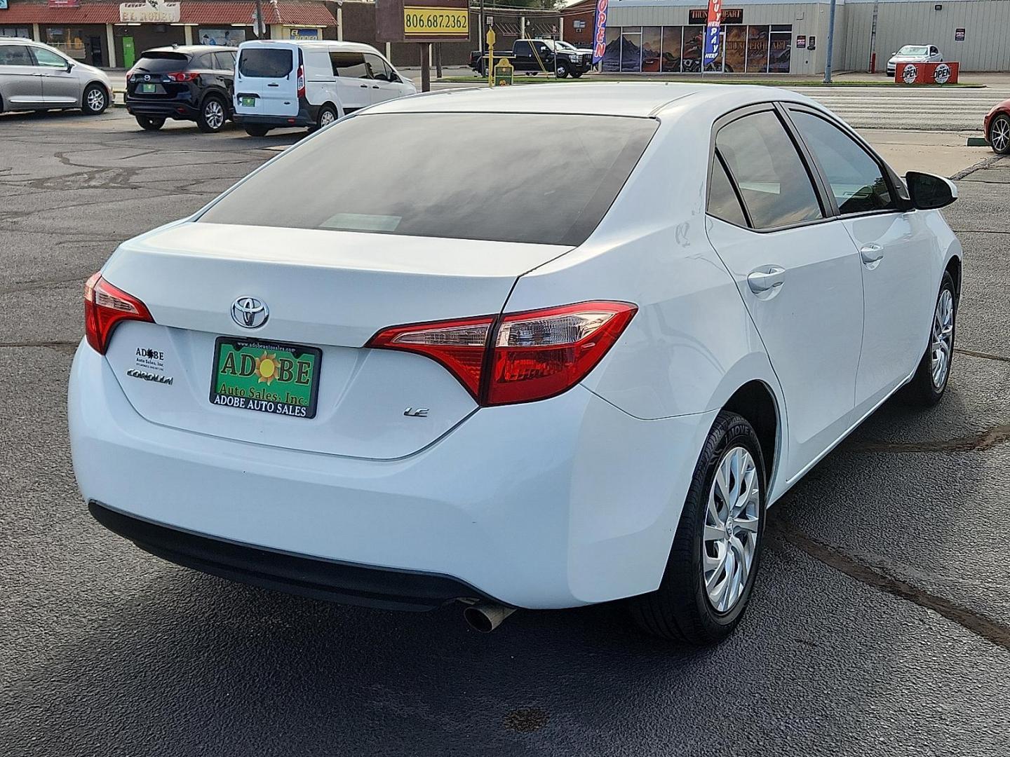2019 WHITE Toyota Corolla LE (2T1BURHE5KC) with an 1.8L I-4 DOHC, VVT-i variable valve control, regular unleaded, engine with 132HP engine, located at 4711 Ave Q, Lubbock, TX, 79412, (806) 687-2362, 33.551304, -101.855293 - Photo#3